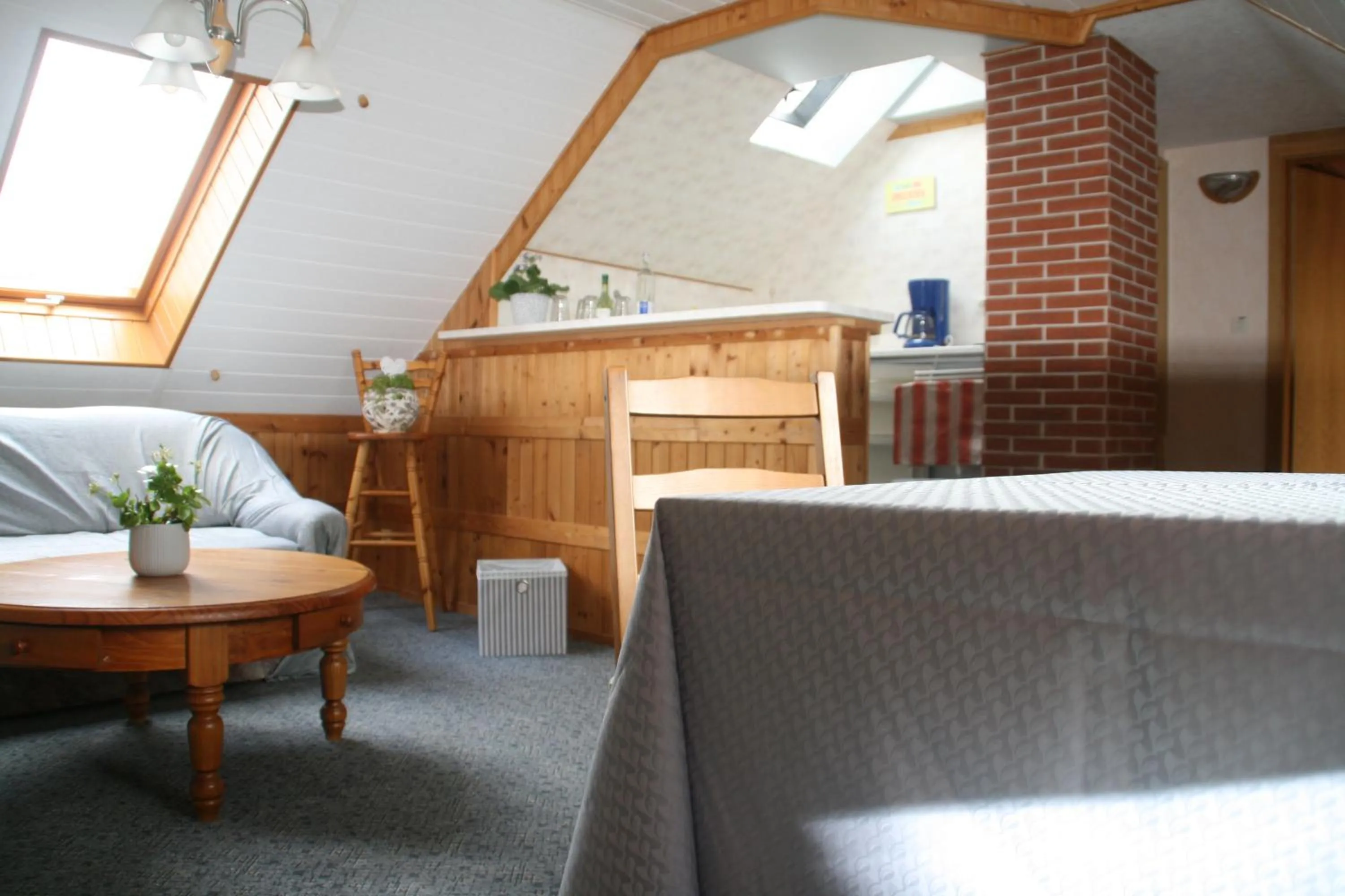 Living room, Bed in Pension Grandel