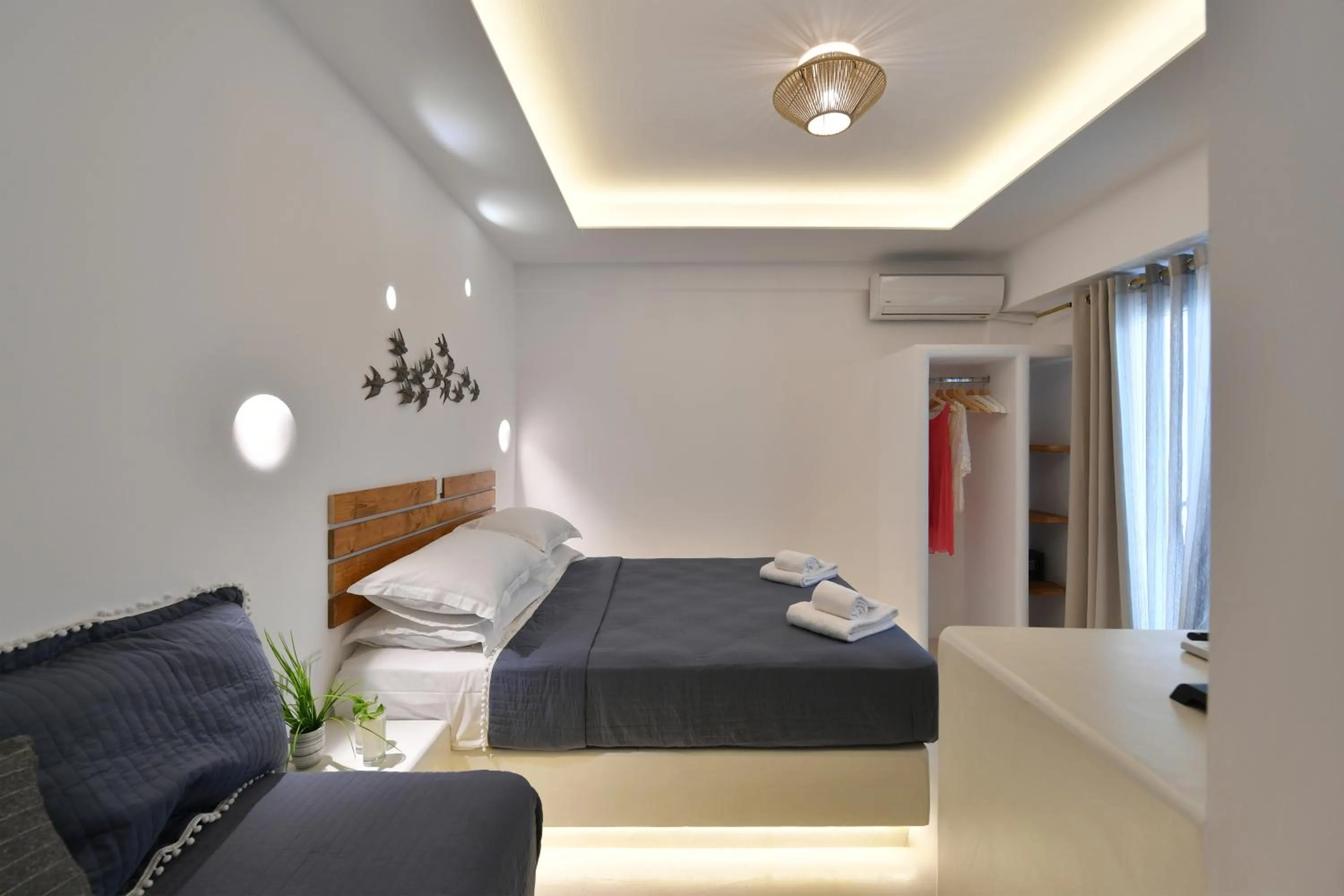 Bed in Ammos Luxury Rooms & Home