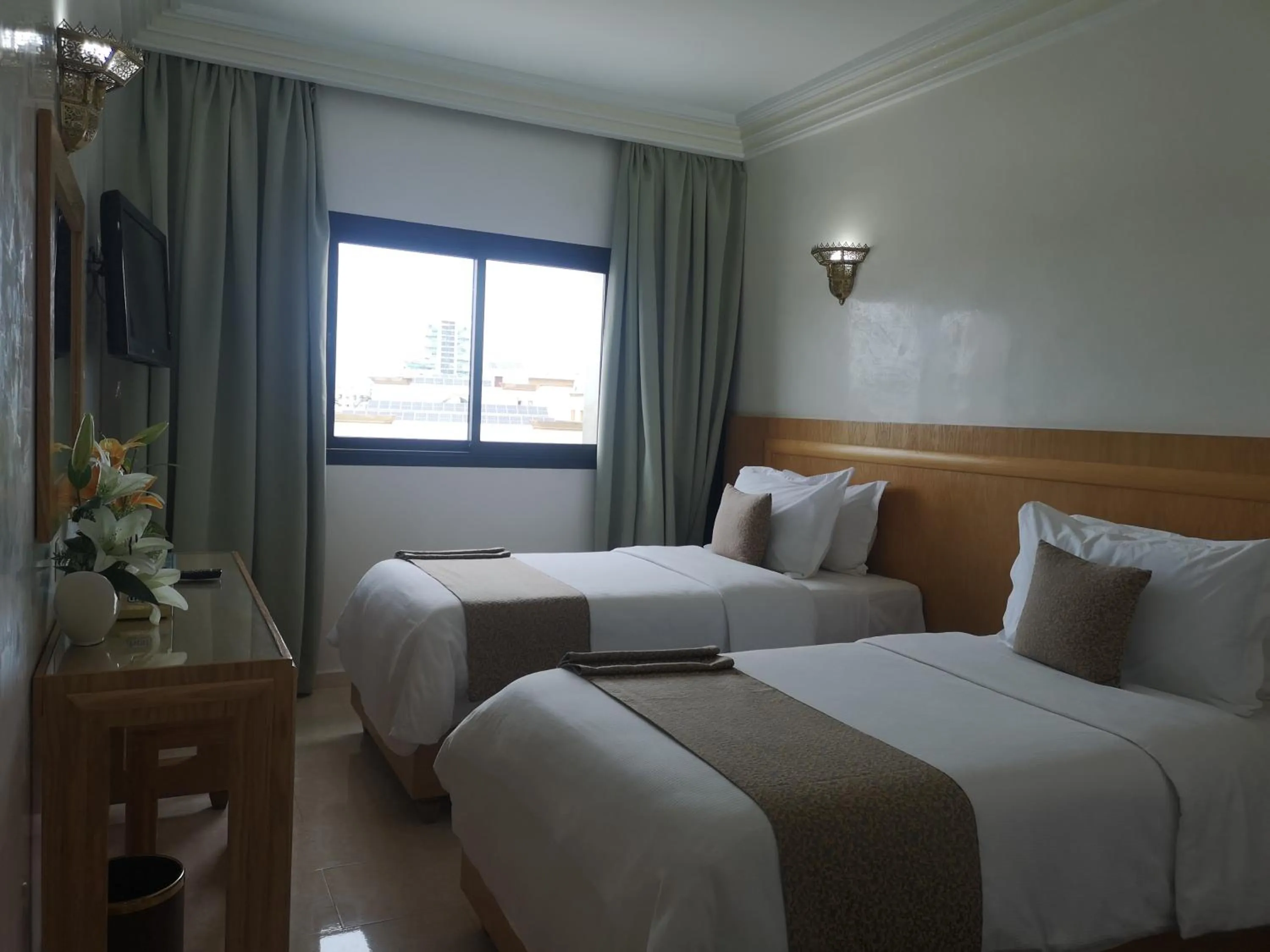 Bed in Majliss Hotel Downtown