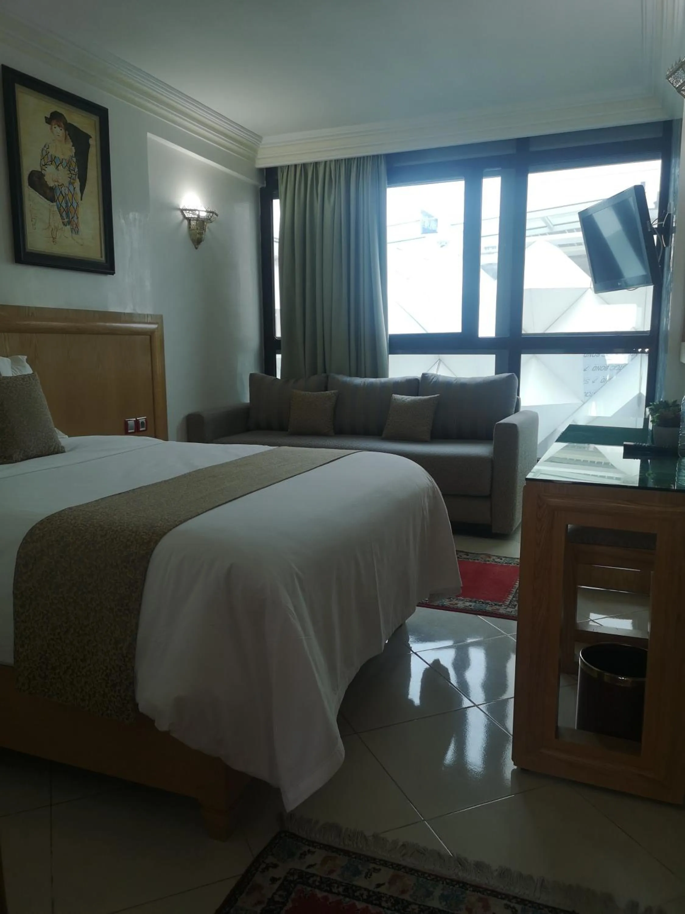 Photo of the whole room, Bed in Majliss Hotel Downtown