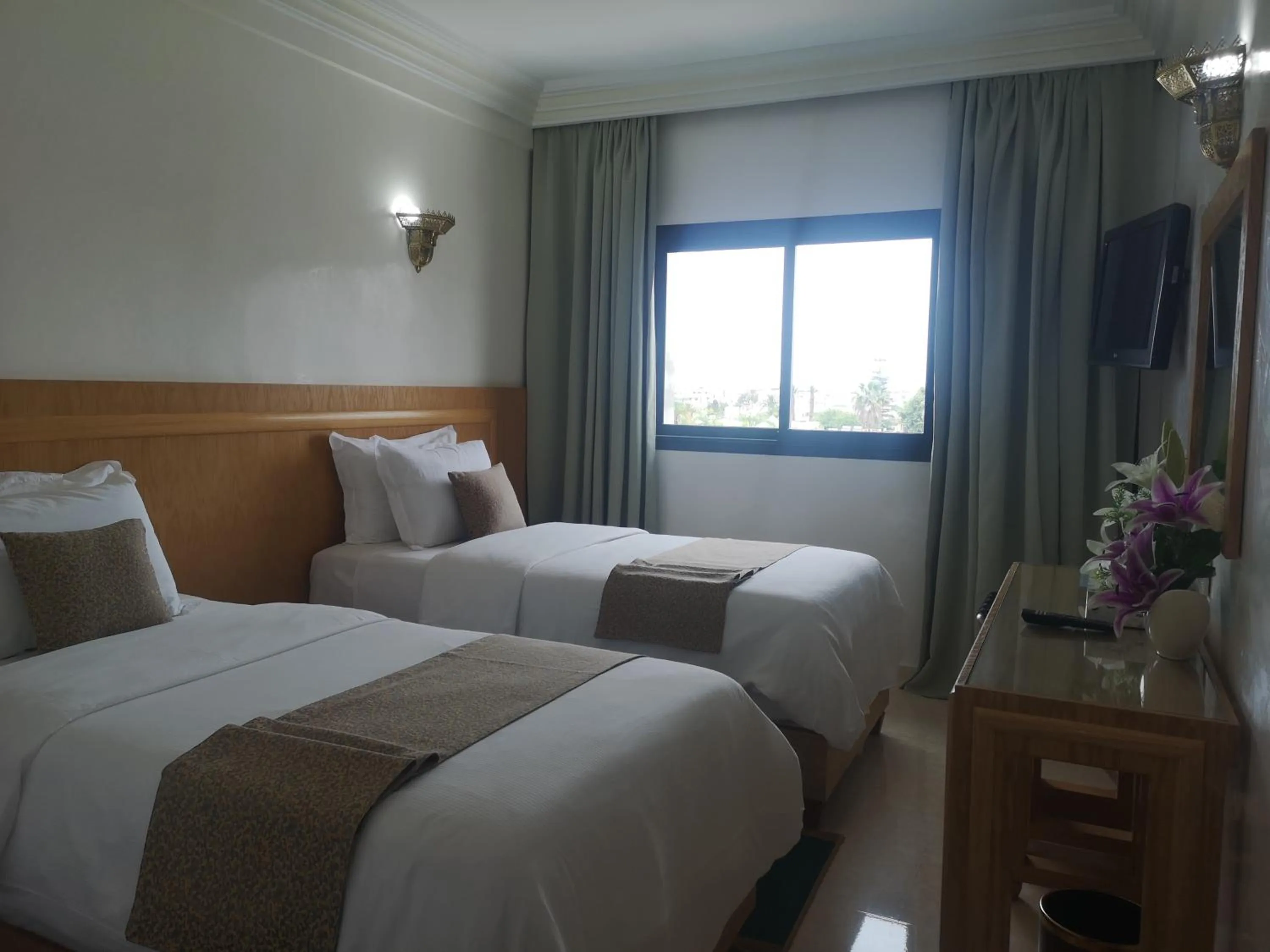 Bed in Majliss Hotel Downtown