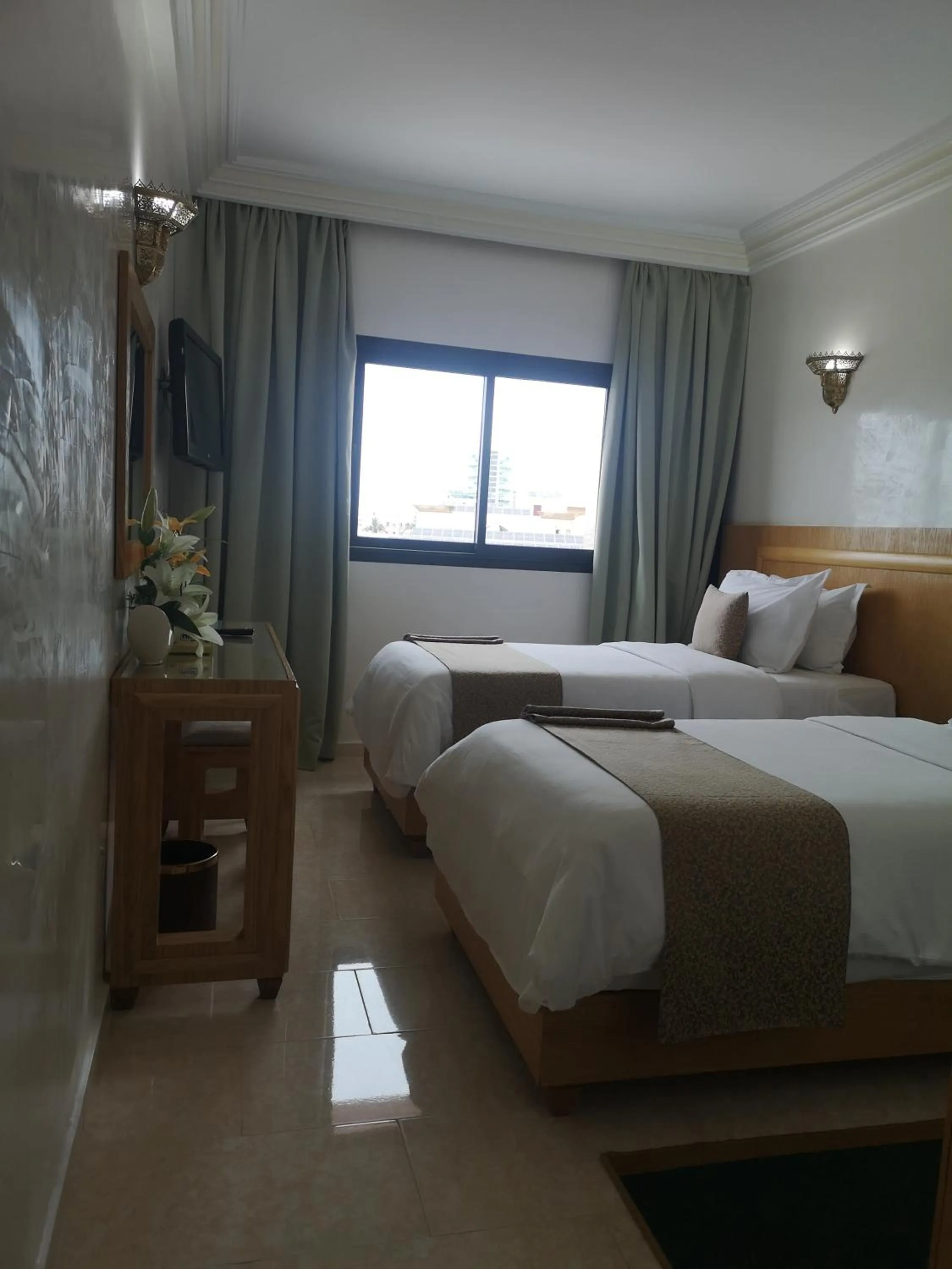 Photo of the whole room, Bed in Majliss Hotel Downtown