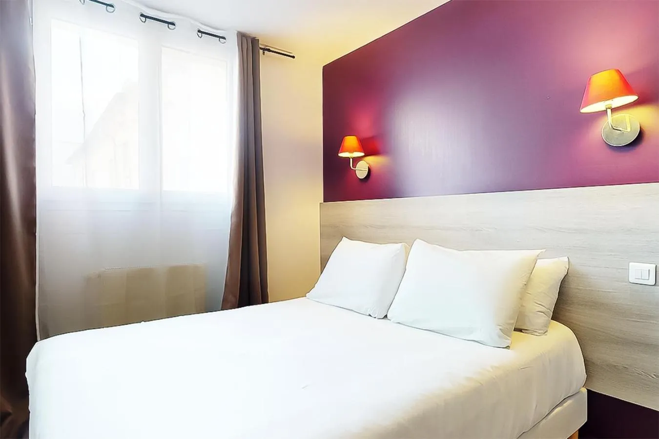 Bed in Hôtel de Ménilmontant