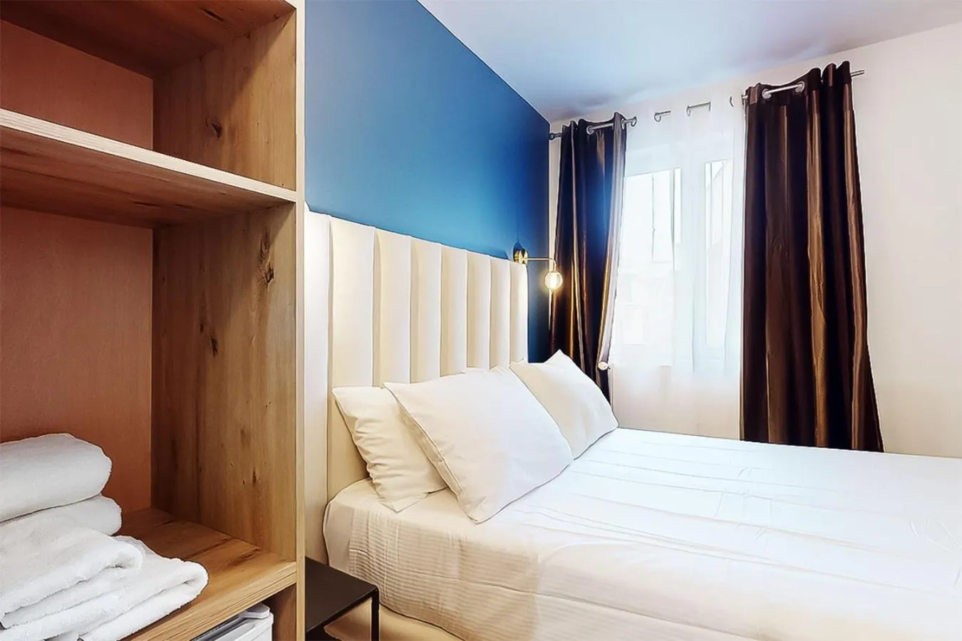 Bed in Hôtel de Ménilmontant