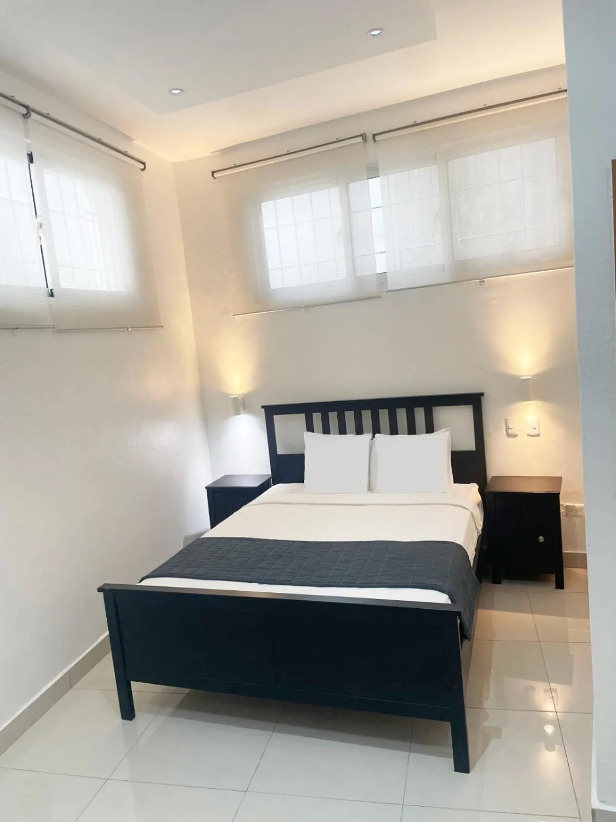 Bed in City Caribbean Hotel Boutique