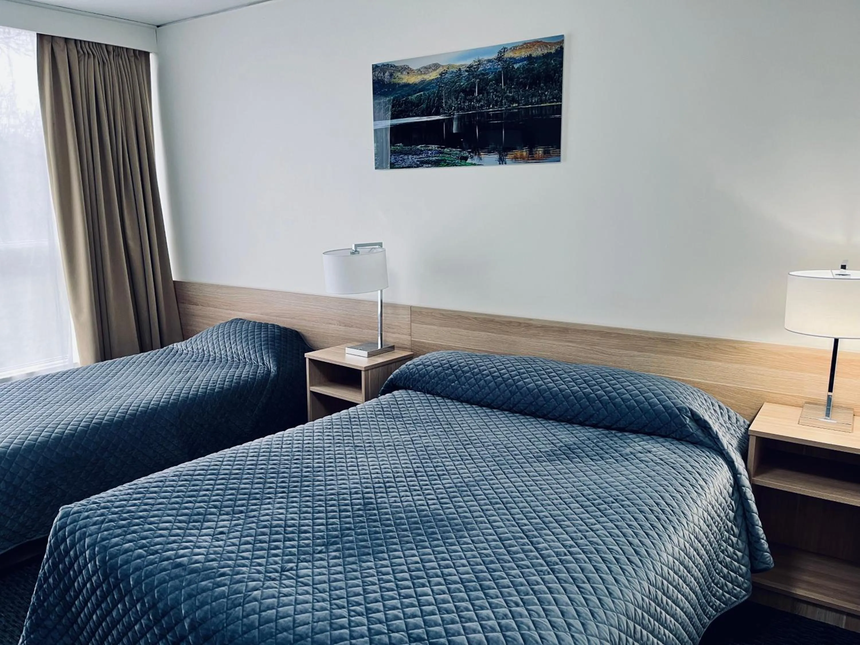 Bed in Heemskirk Motor Hotel