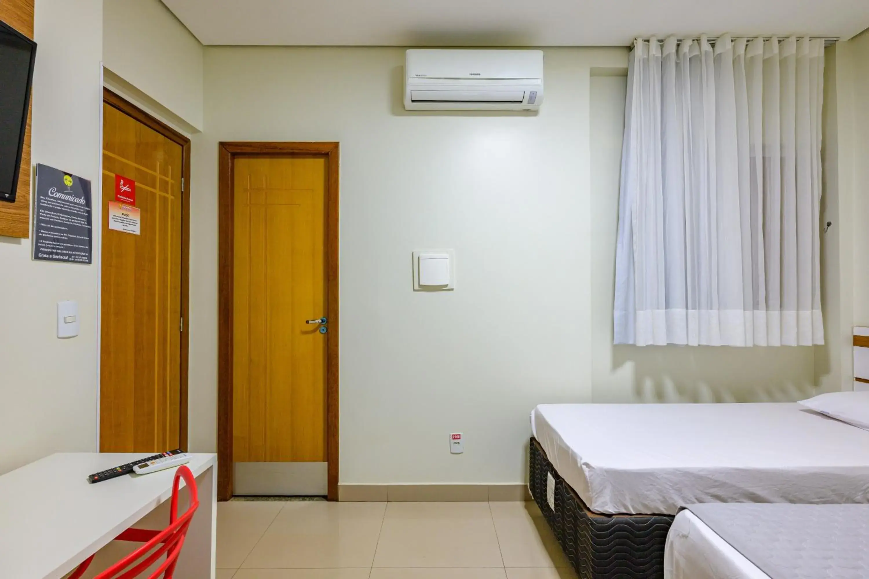 Triple Room (1 Double bed + 1 Single bed) in OYO Tropical Confort Hotel, Brasilia Triple Room (1 Double bed + 1 Single bed) in OYO Tropical Confort Hotel, Brasilia