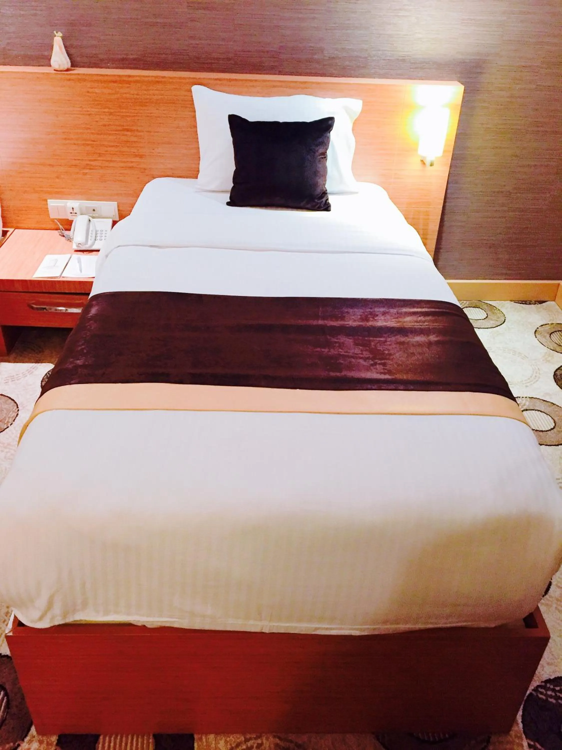 Bed in Grand Palace Hotel Erbil