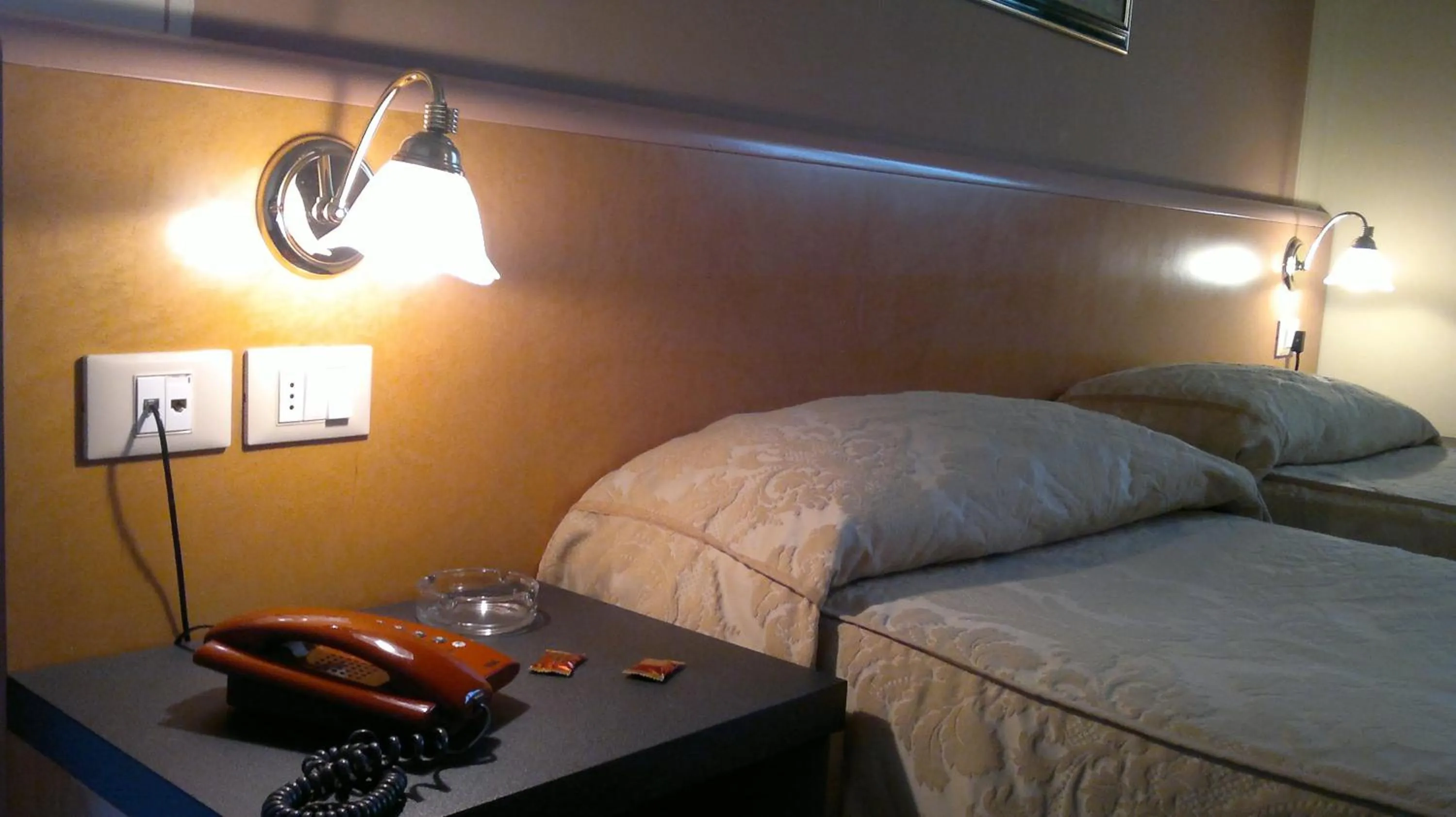 Bed in Hotel Riviera