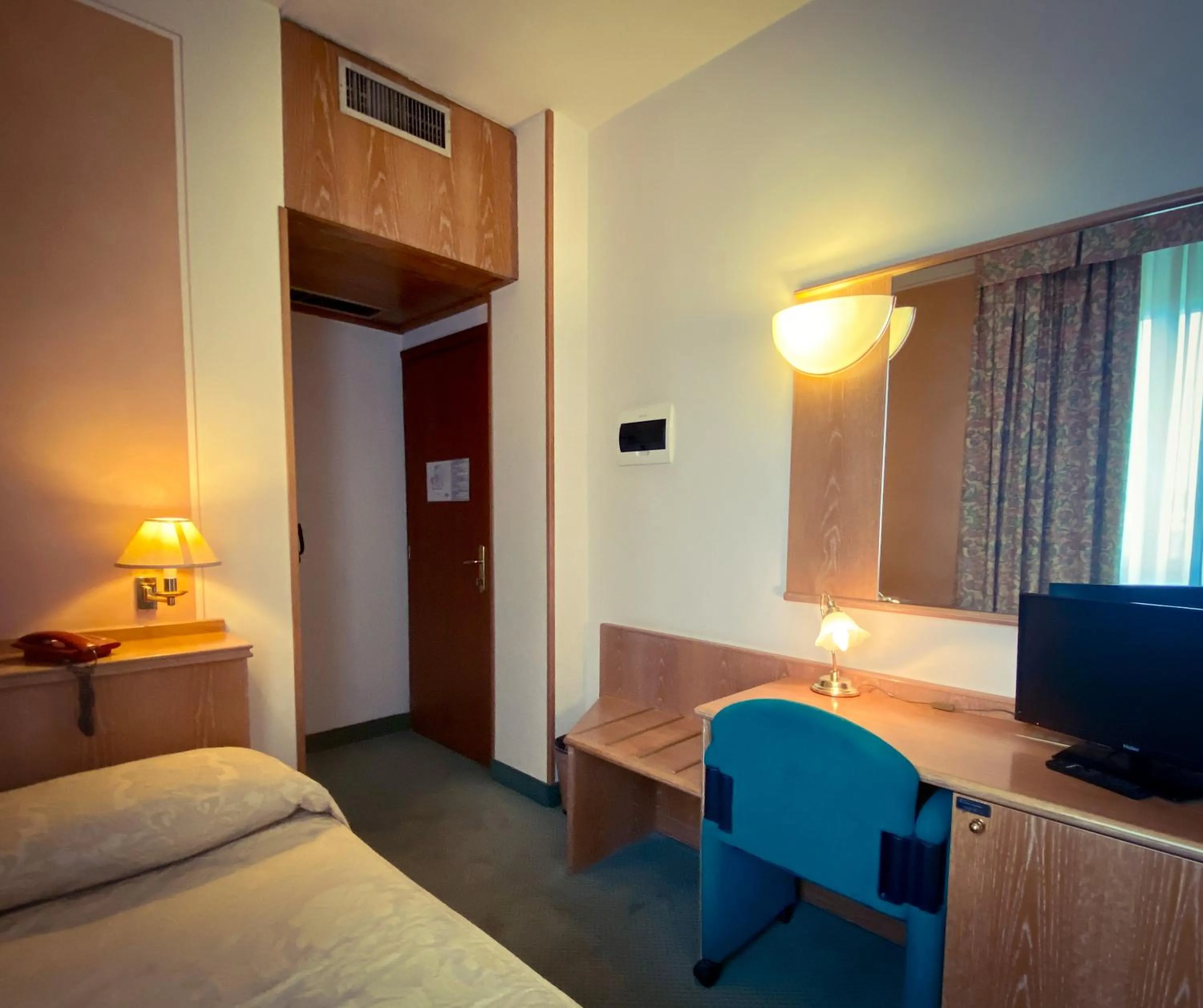 Bed in Hotel Riviera