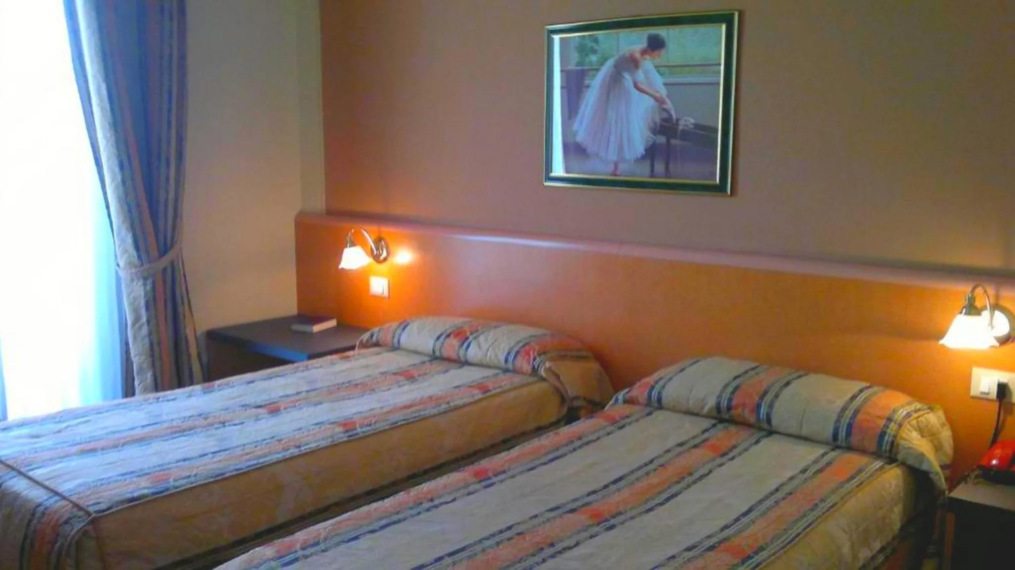 Bed in Hotel Riviera