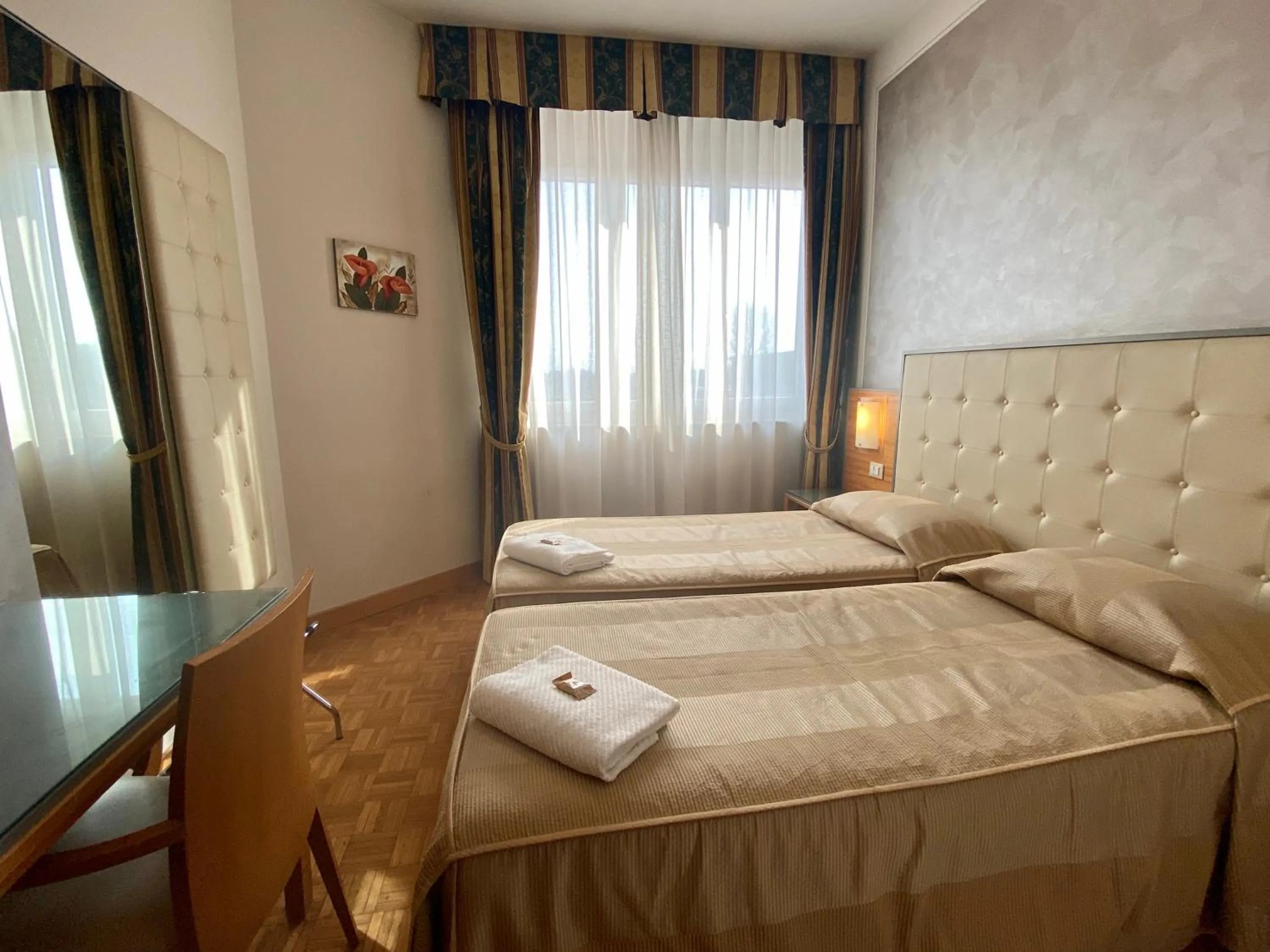 Bed in Hotel Riviera