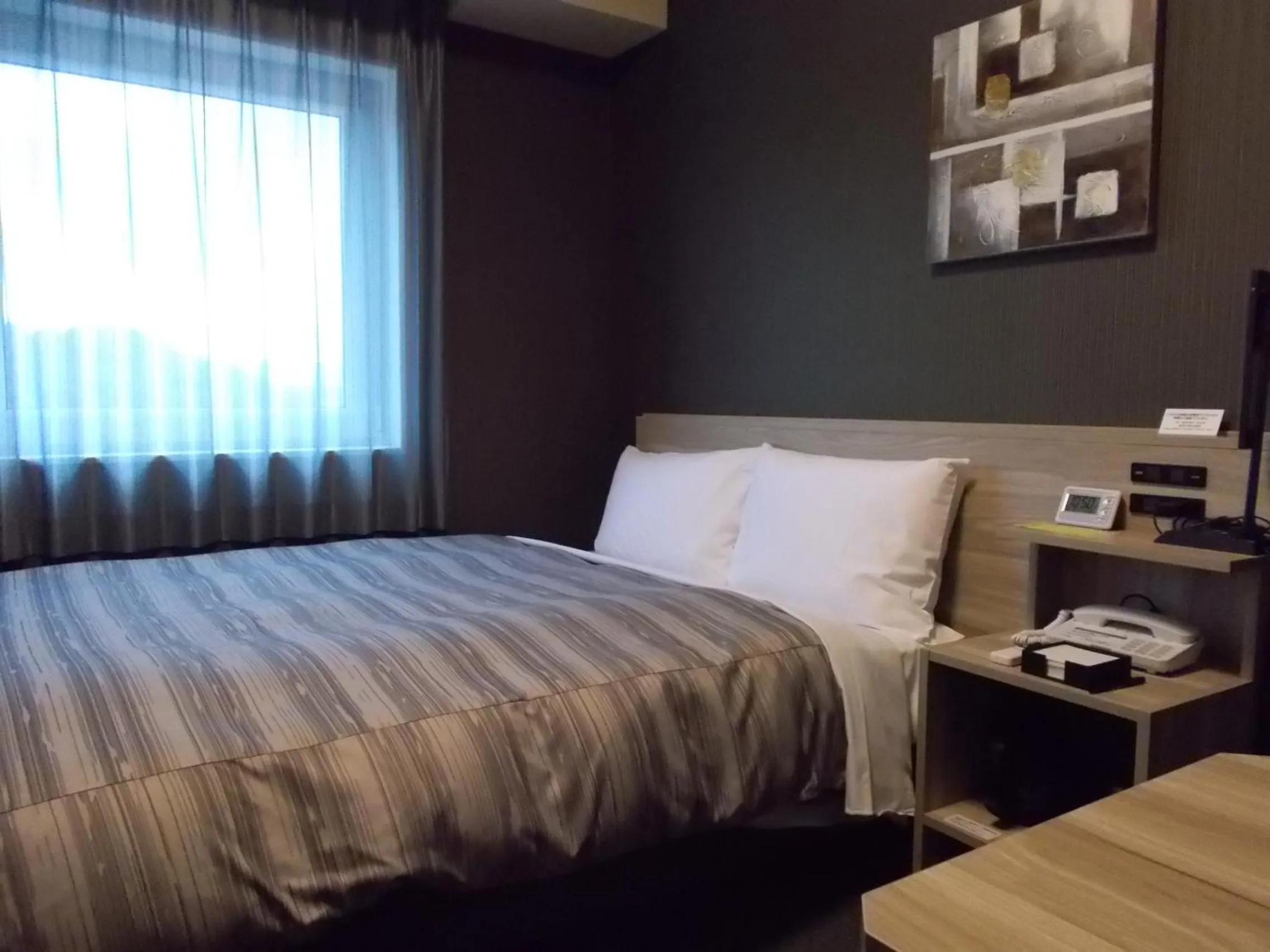 Photo of the whole room, Bed in Hotel Route-Inn Masuda