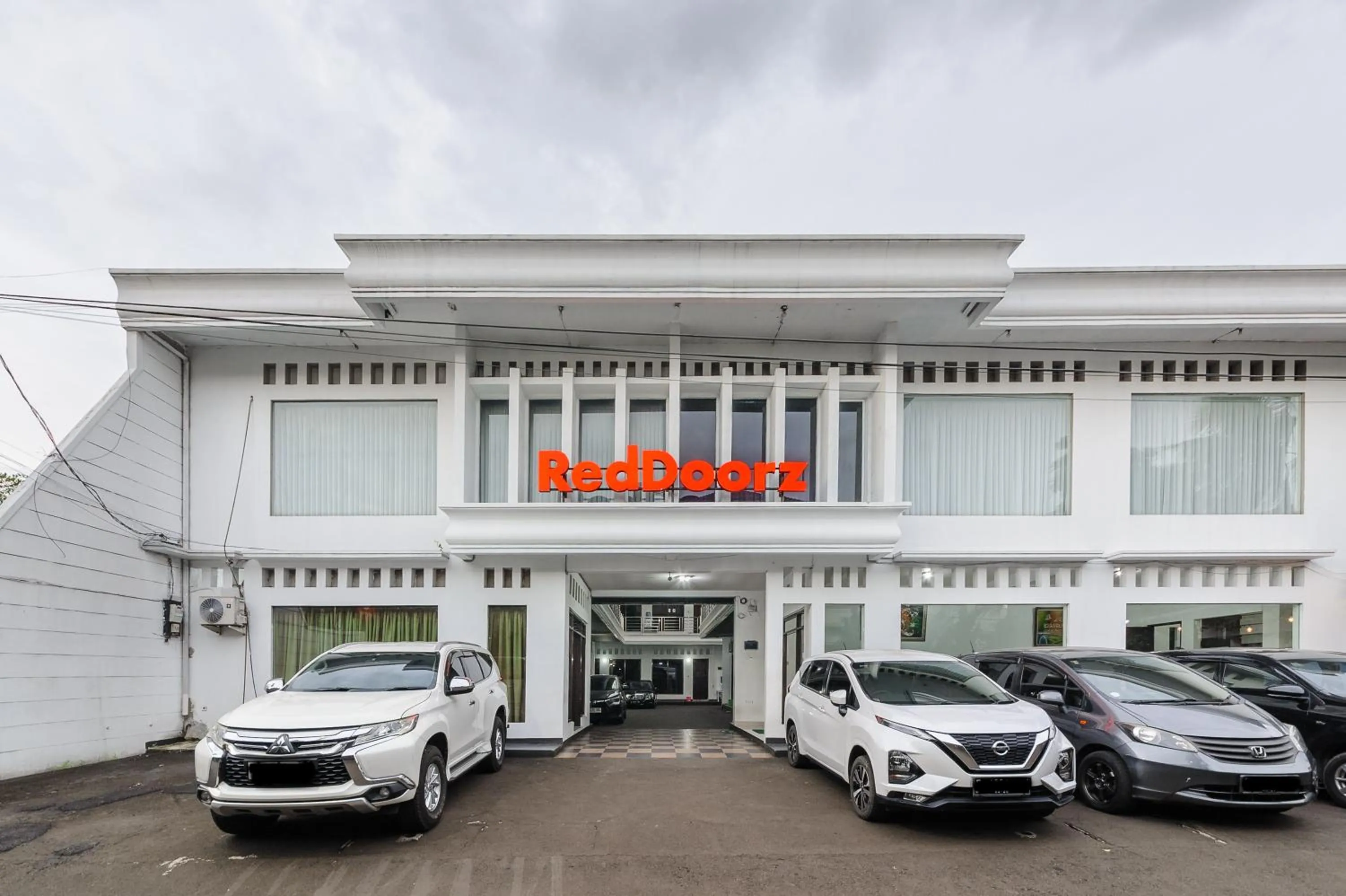 Facade/entrance in RedDoorz Syariah near Taman Air Mancur Bogor