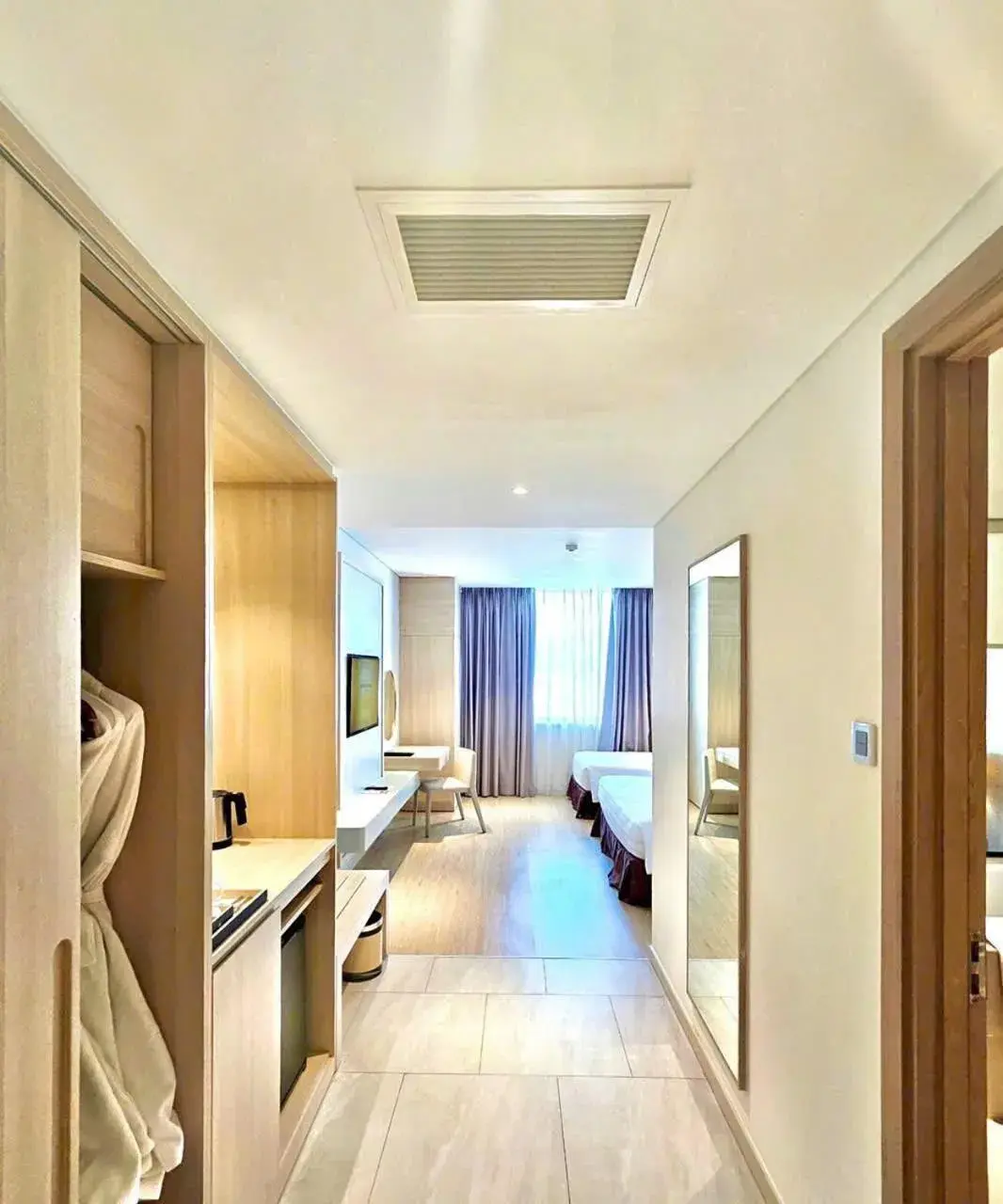 Bed in DQua Hotel Bed in DQua Hotel