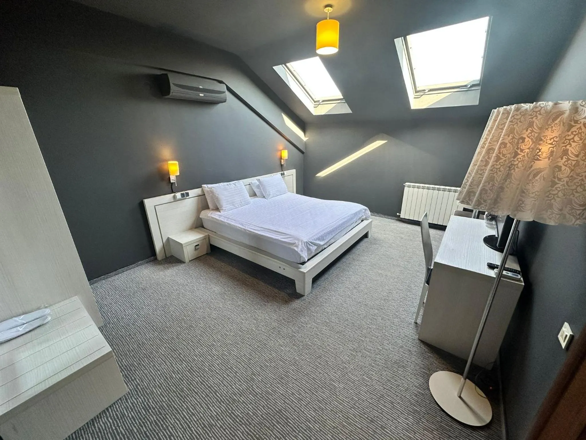 Bed in Alex&George Boutique Hotel