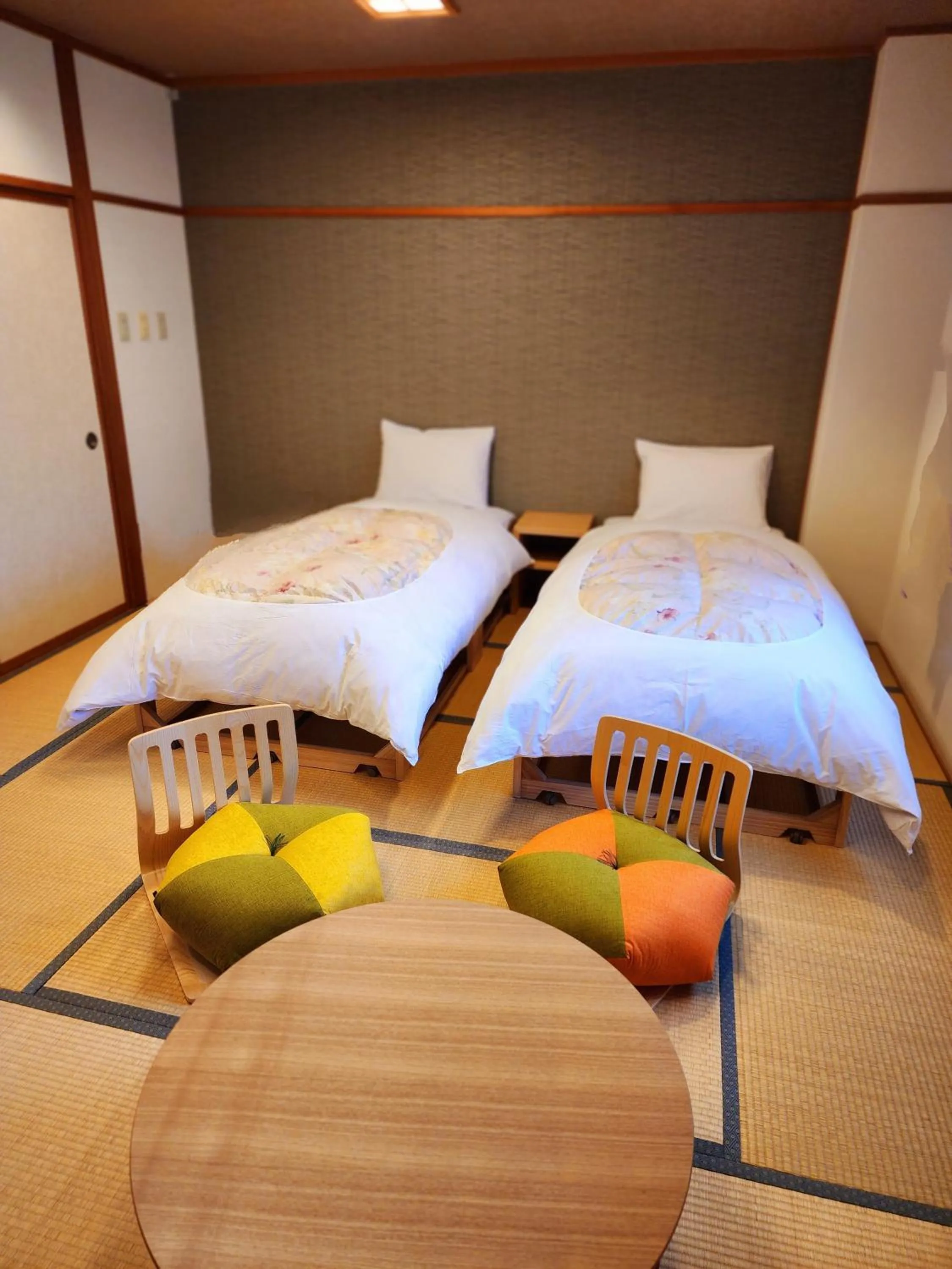 Bed in Hakuba Hotel Hana-no-Sato
