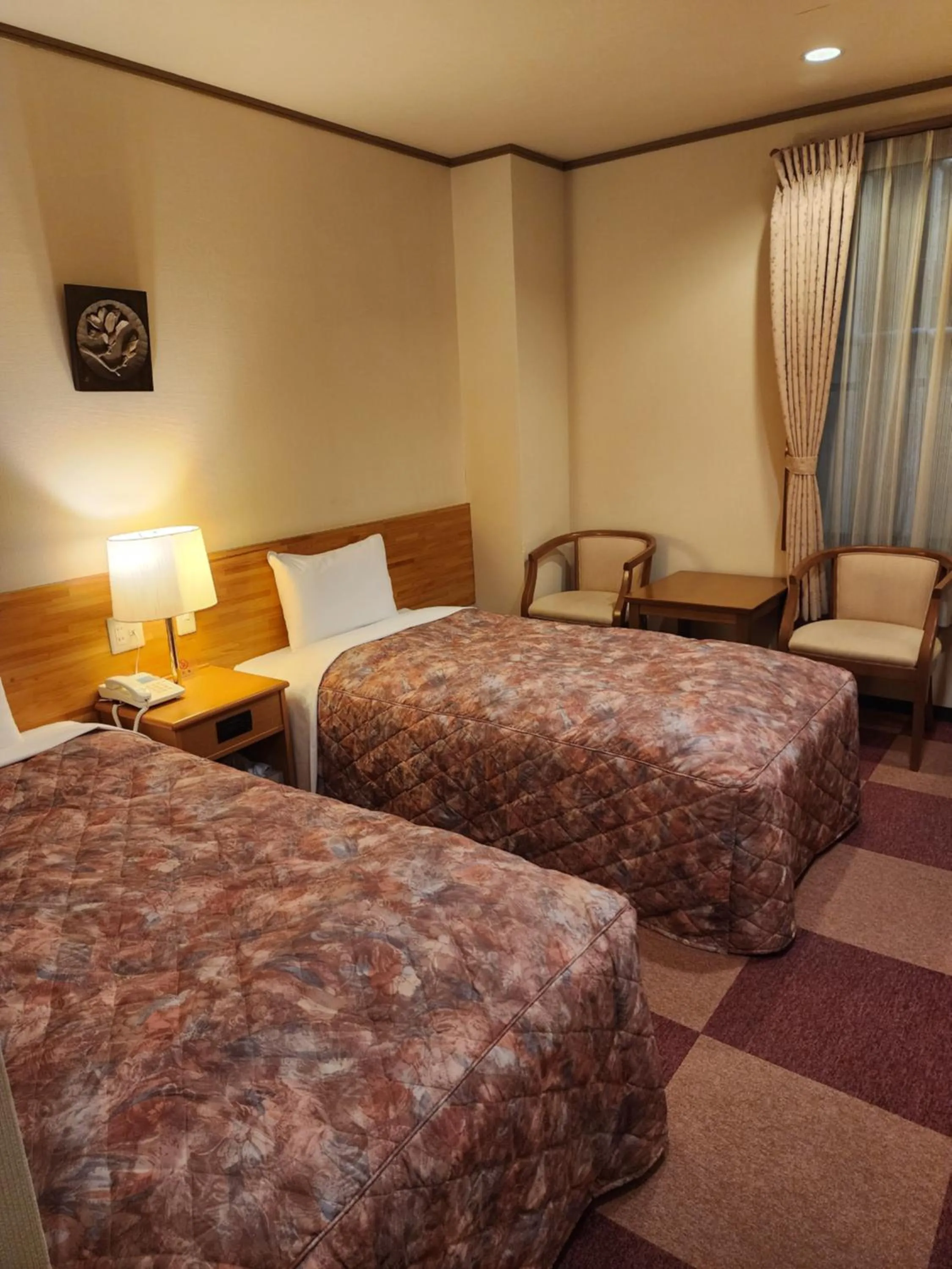 Bed in Hakuba Hotel Hana-no-Sato