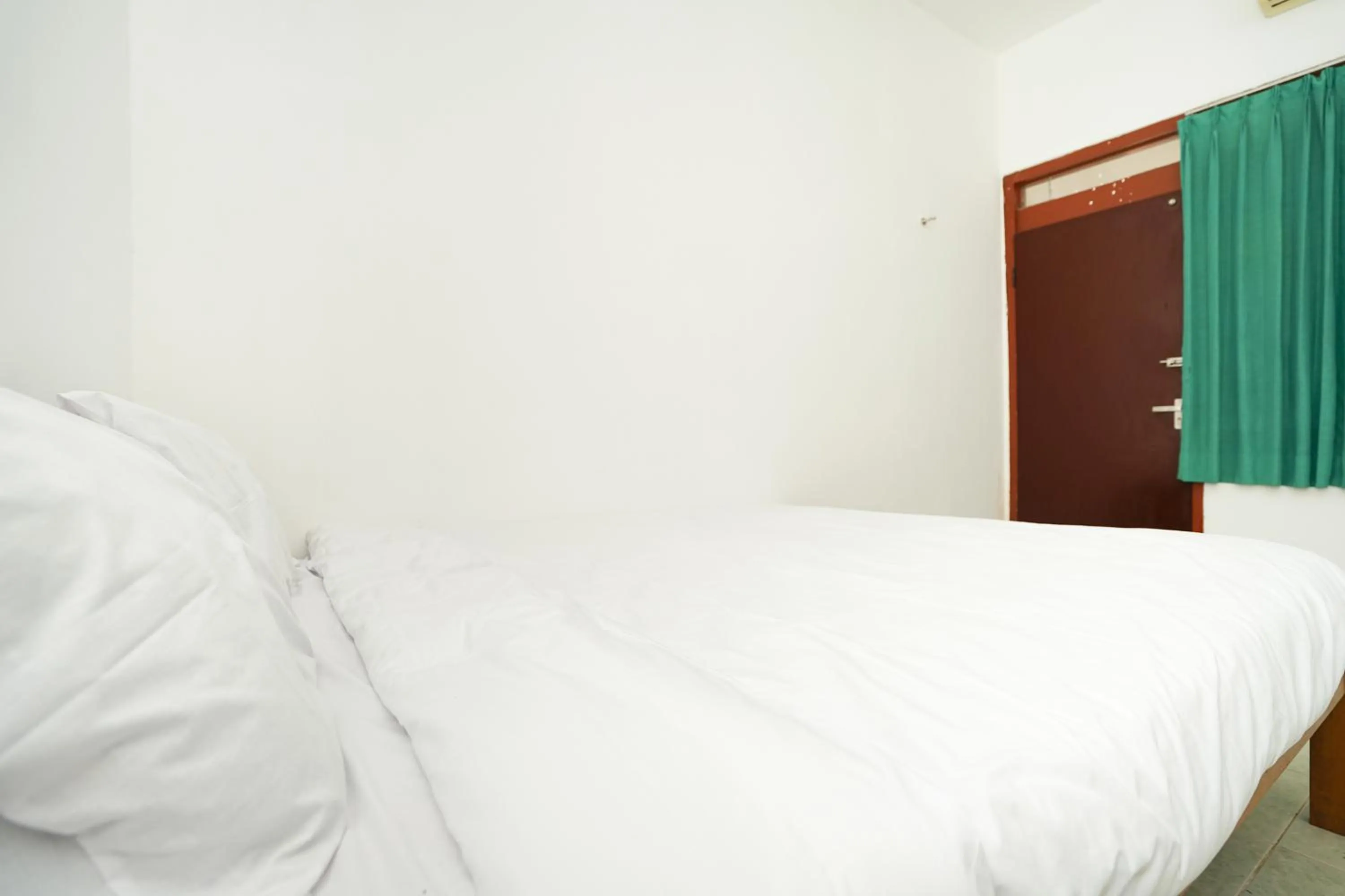 Bedroom, Bed in Merapi Inn Syariah by ecommerceloka