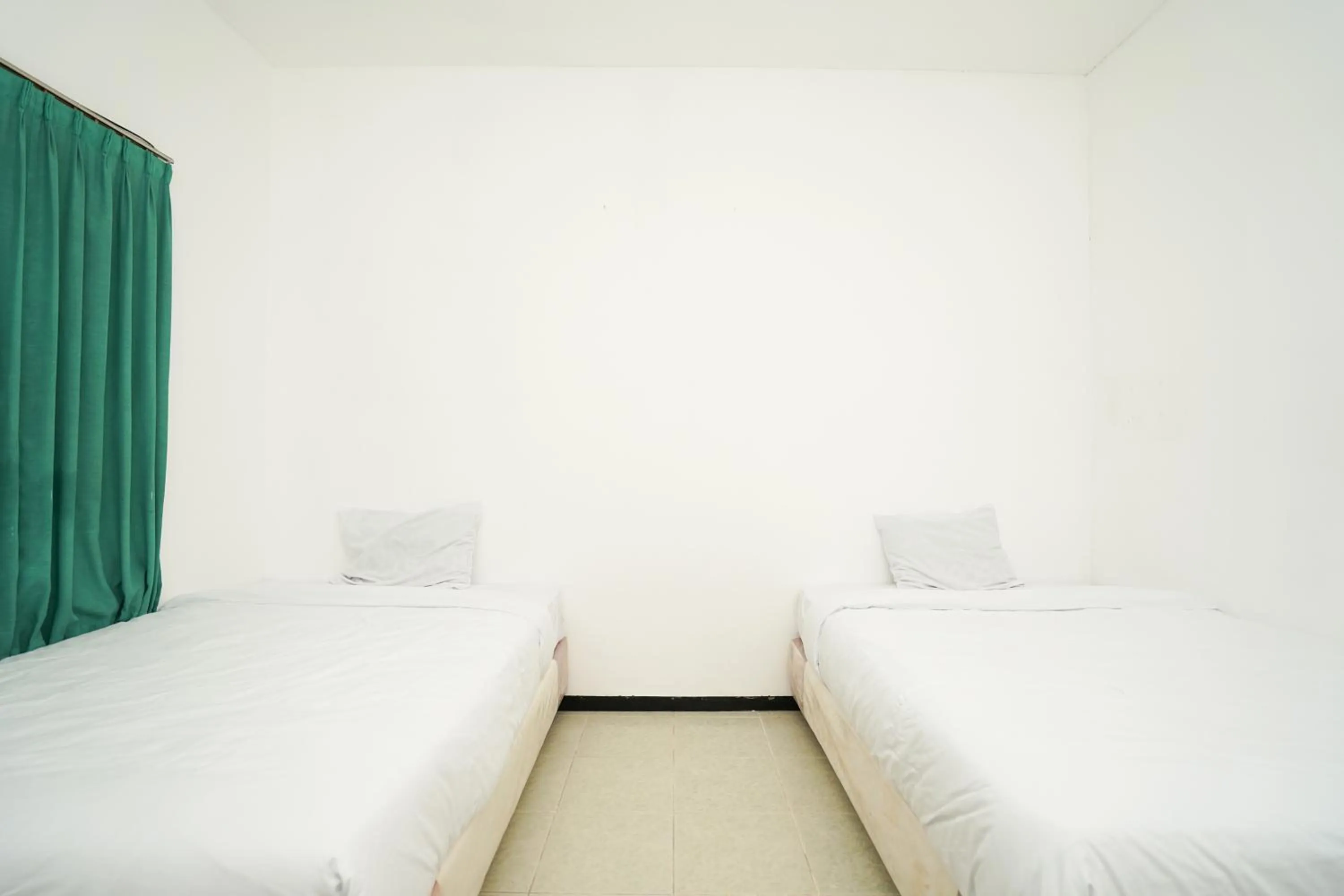 Bedroom, Bed in Merapi Inn Syariah by ecommerceloka