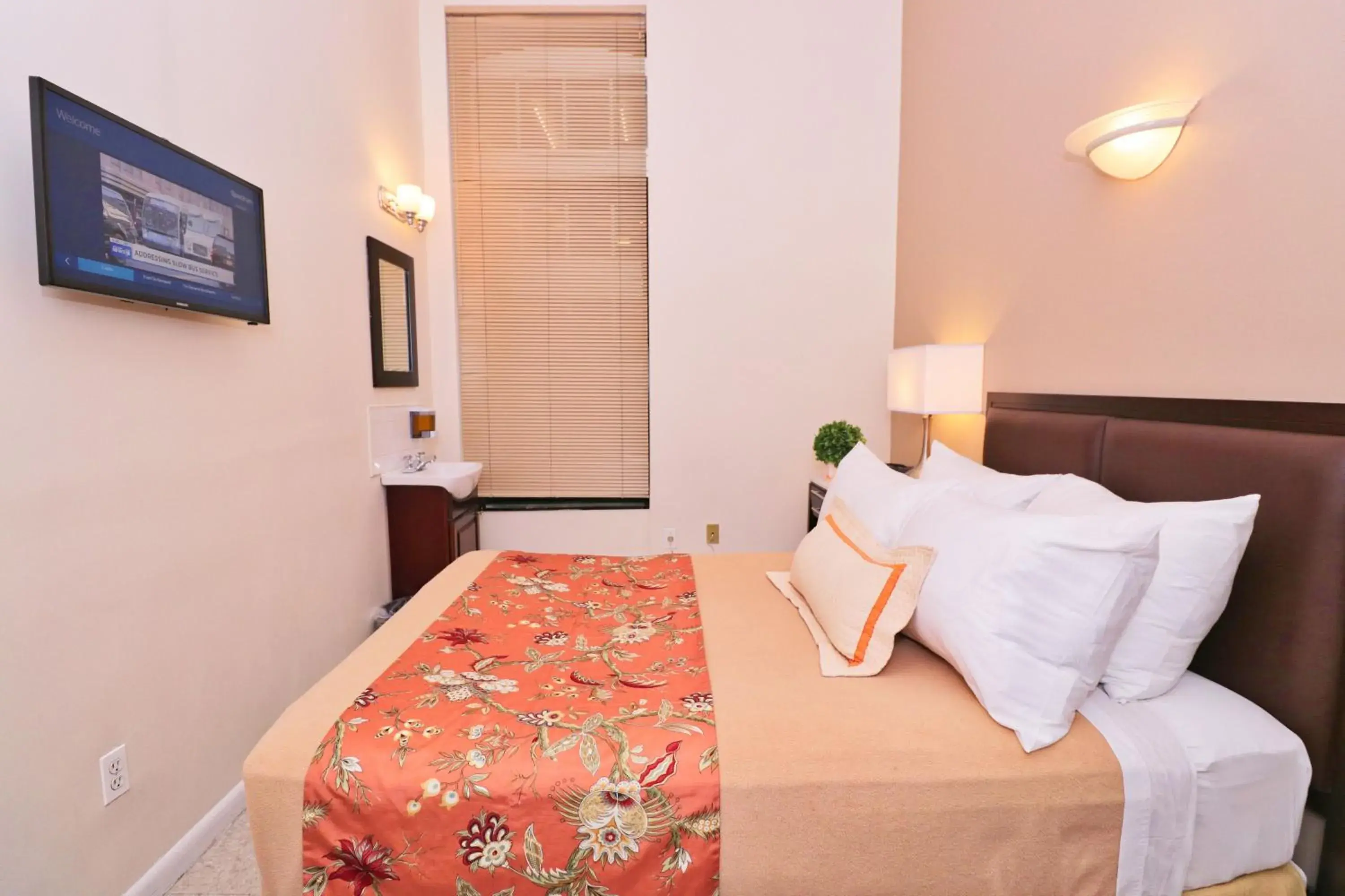 Bed in Americana Inn Bed in Americana Inn