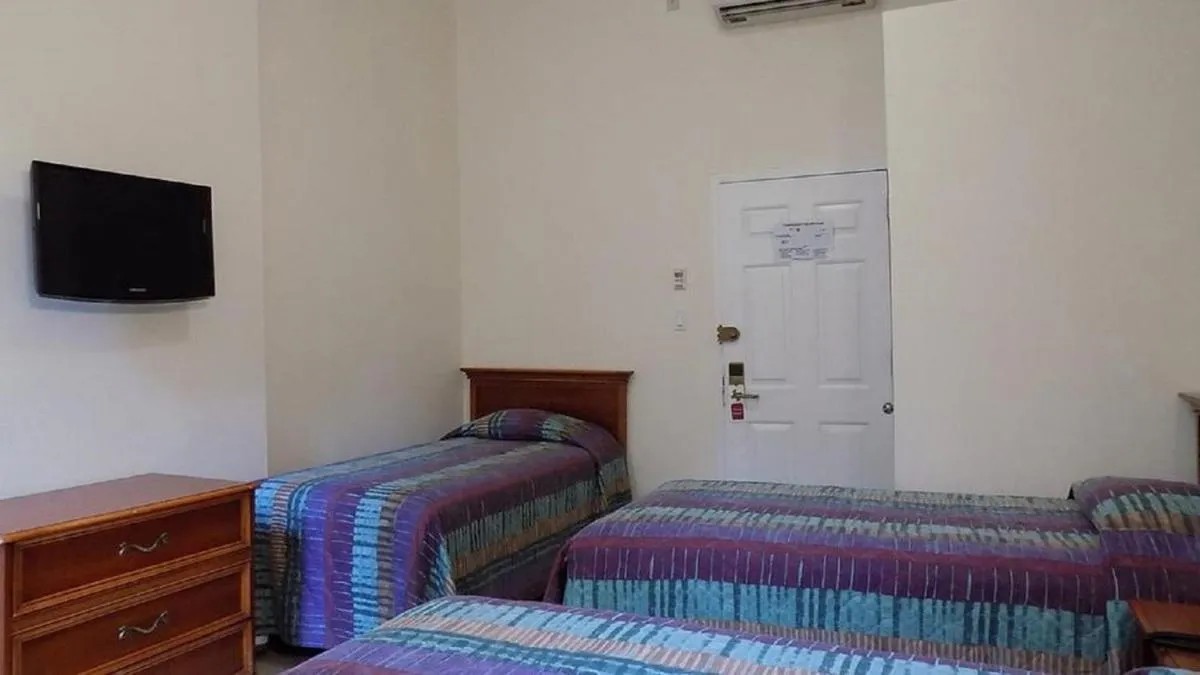 Bed in Americana Inn