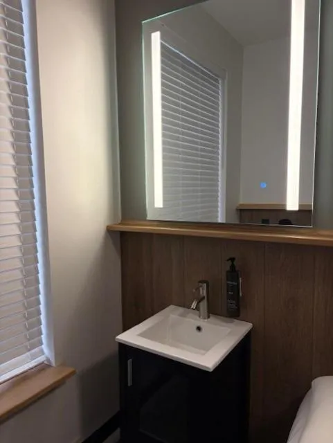 Bathroom in Americana Inn