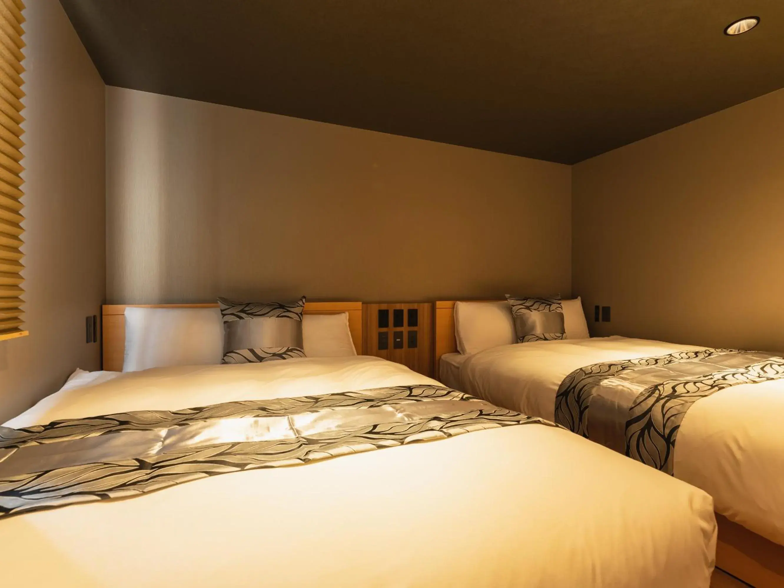 Bedroom, Bed in GRAND BASE Beppu Ekimae Bedroom, Bed in GRAND BASE Beppu Ekimae