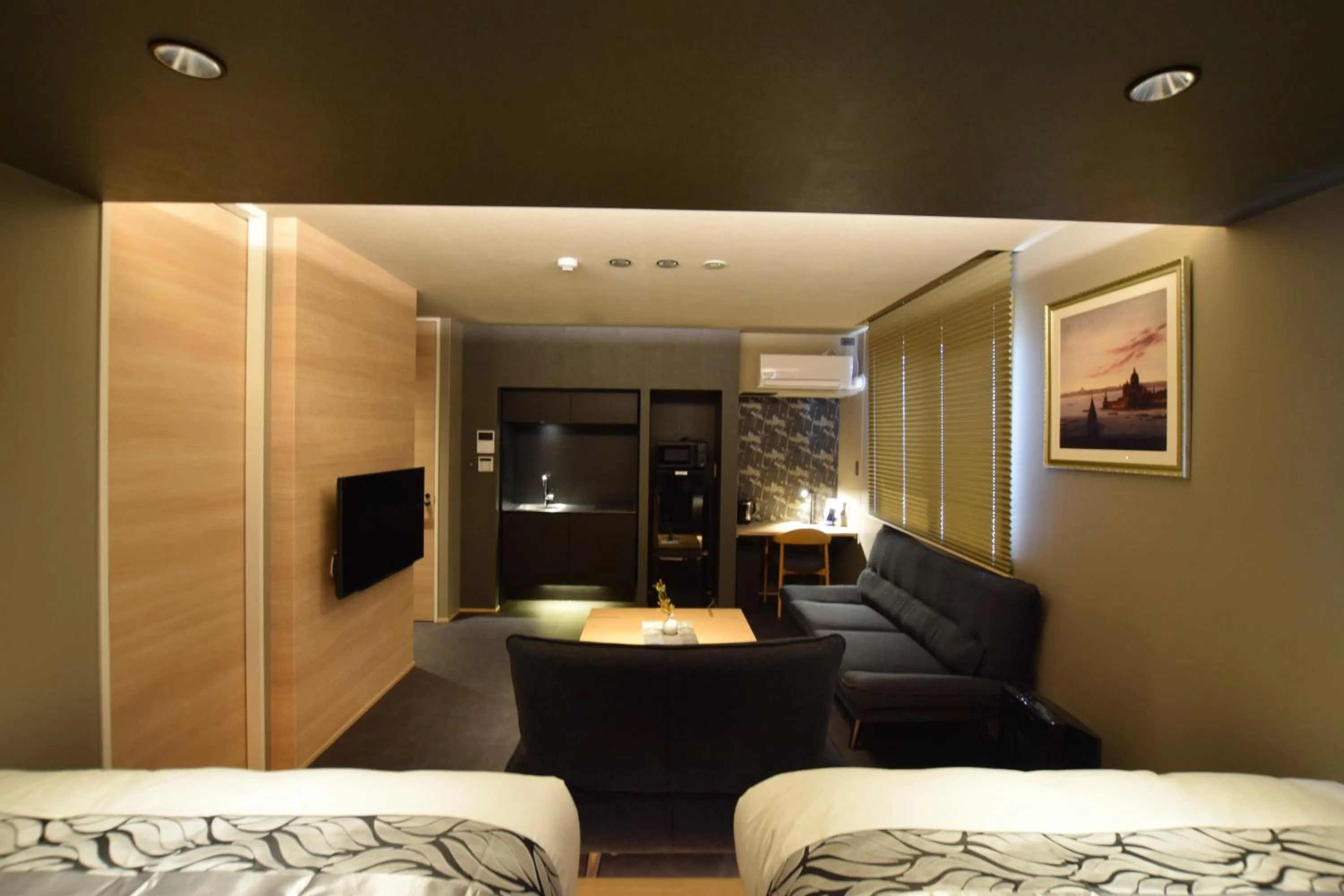 Photo of the whole room in GRAND BASE Beppu Ekimae