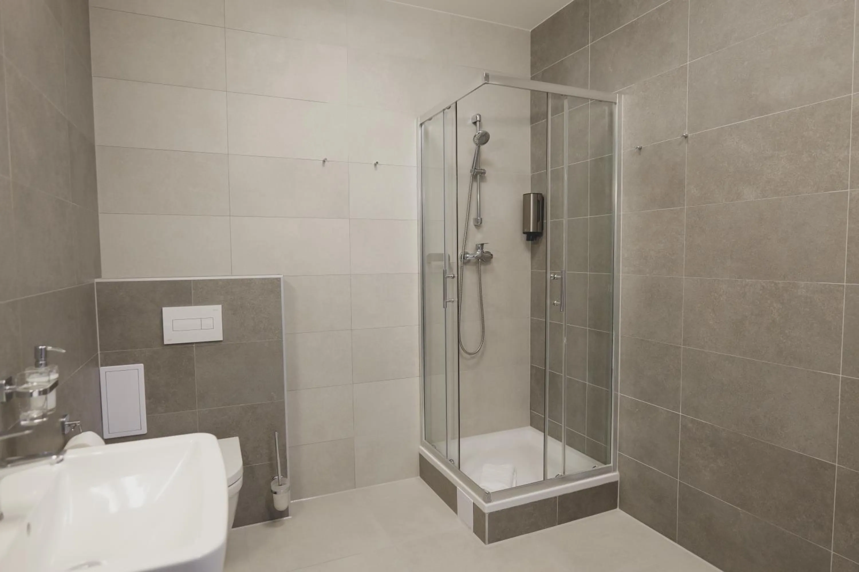 Shower in Gold Art Apartments