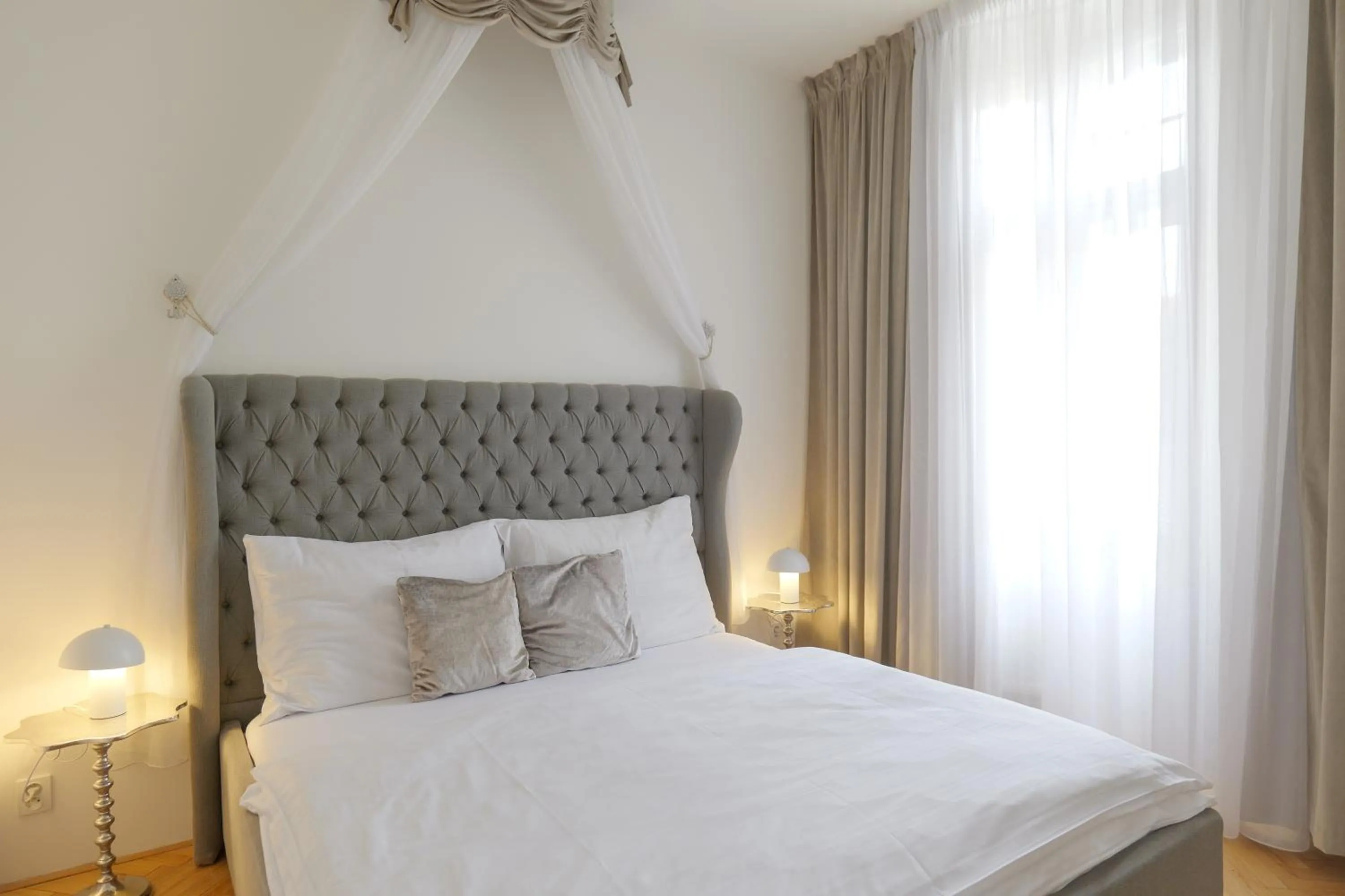 Bed in Gold Art Apartments