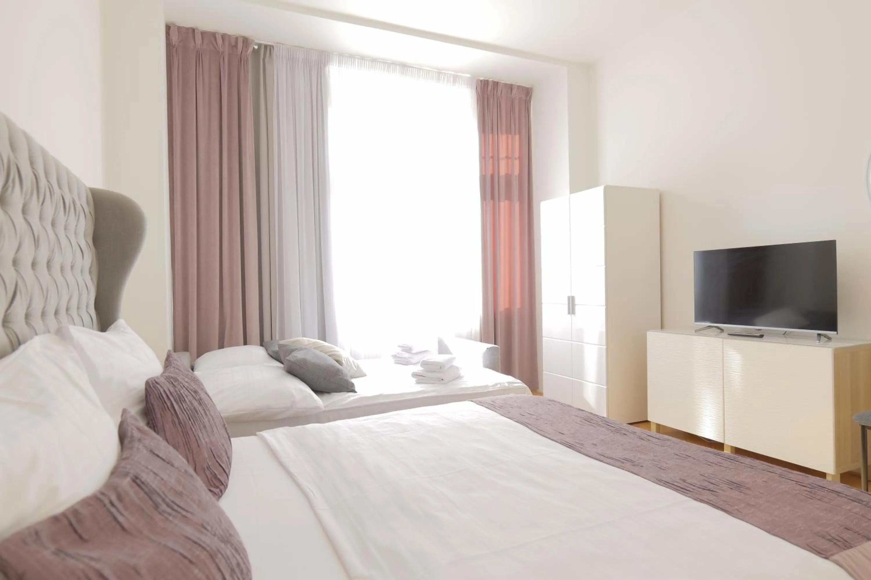 Bed in Gold Art Apartments