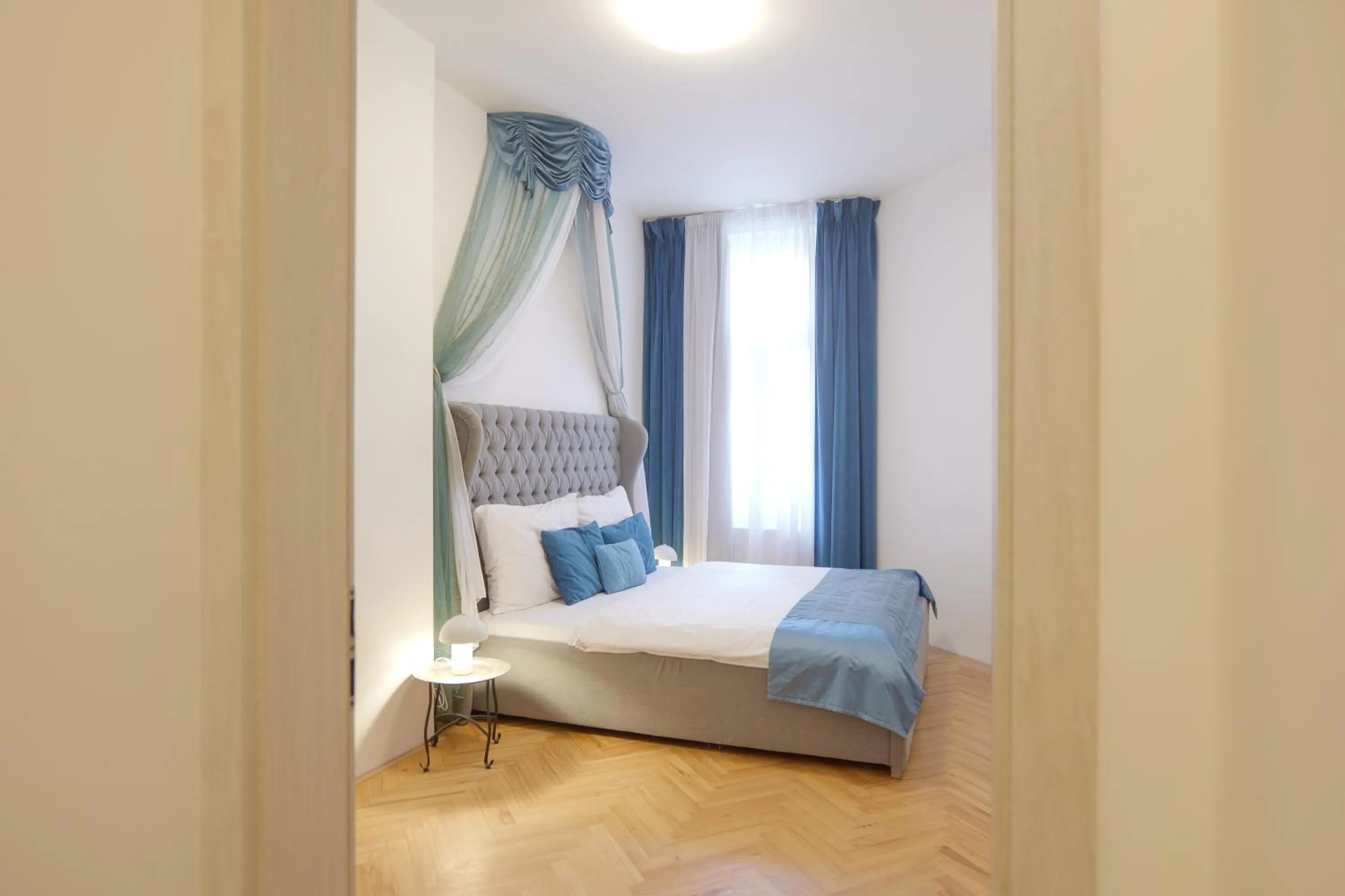 Bed in Gold Art Apartments