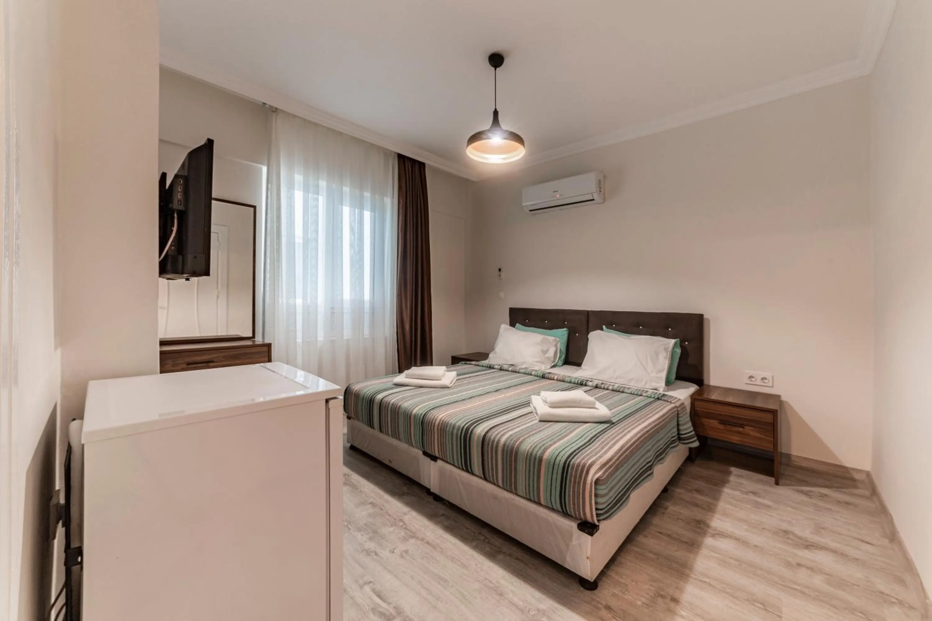 Photo of the whole room, Bed in TEMA LARA APART