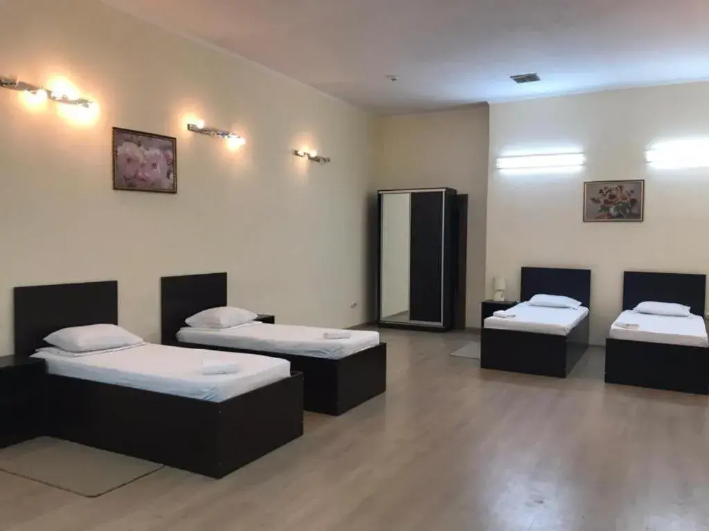 Economy Quadruple Room with Shared Bathroom in Hotel Complex Verhovina Economy Quadruple Room with Shared Bathroom in Hotel Complex Verhovina