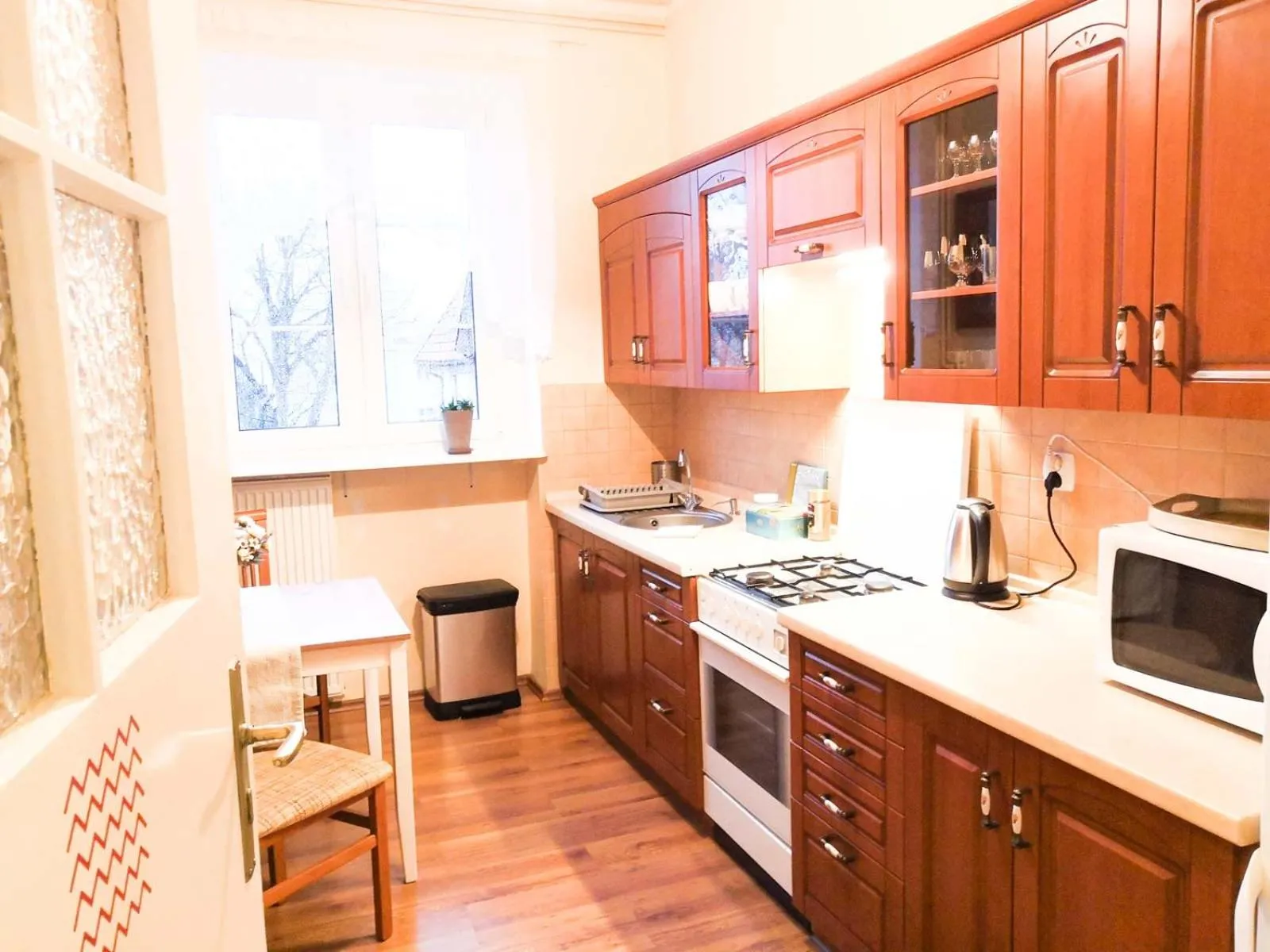 Kitchen or kitchenette in Bankowa 8 Guest Rooms