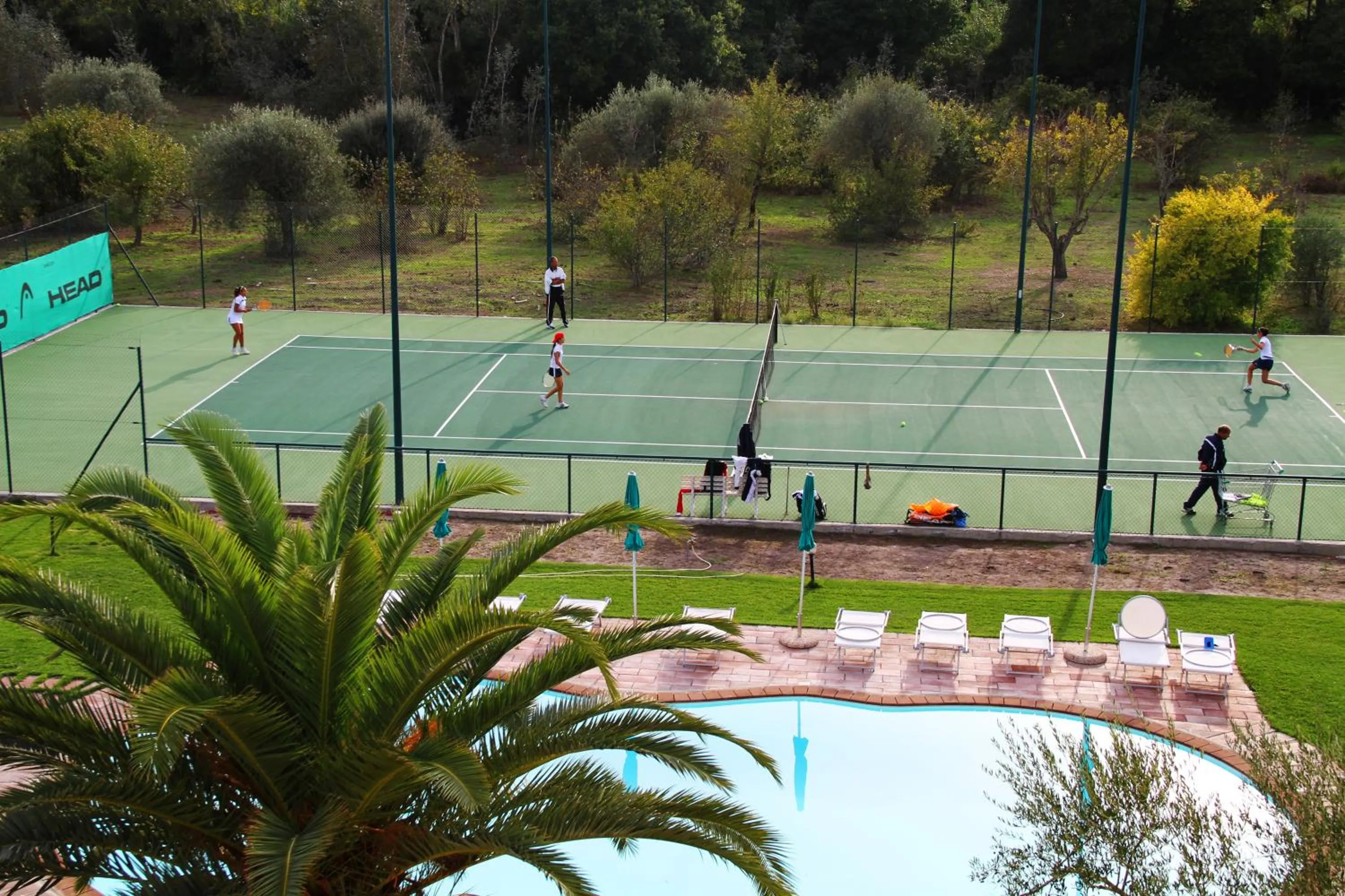 Tennis court in Alghero Resort Country Hotel & Spa