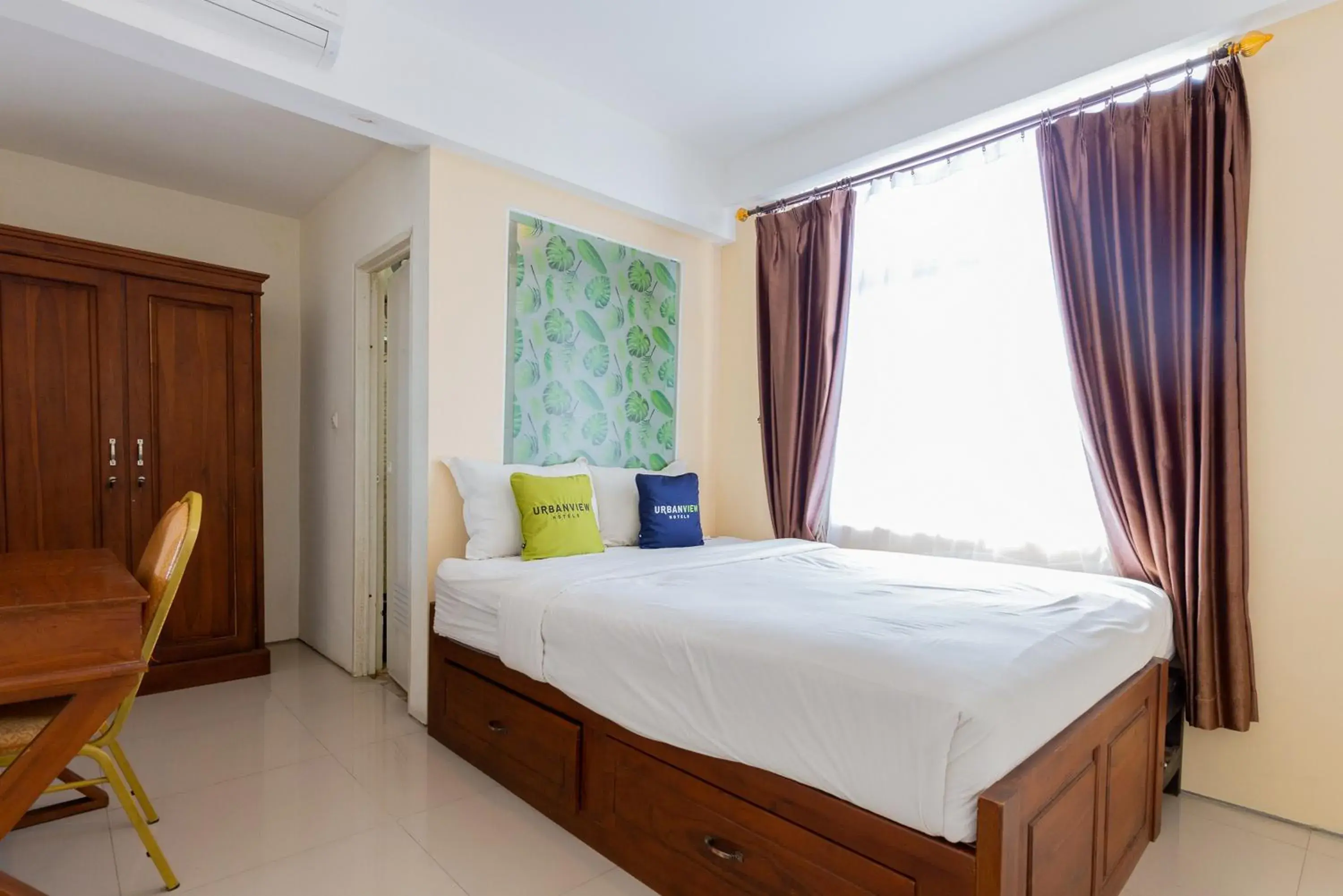 Bed in Urbanview Erga Family Residence Syariah Surabaya by RedDoorz Bed in Urbanview Erga Family Residence Syariah Surabaya by RedDoorz