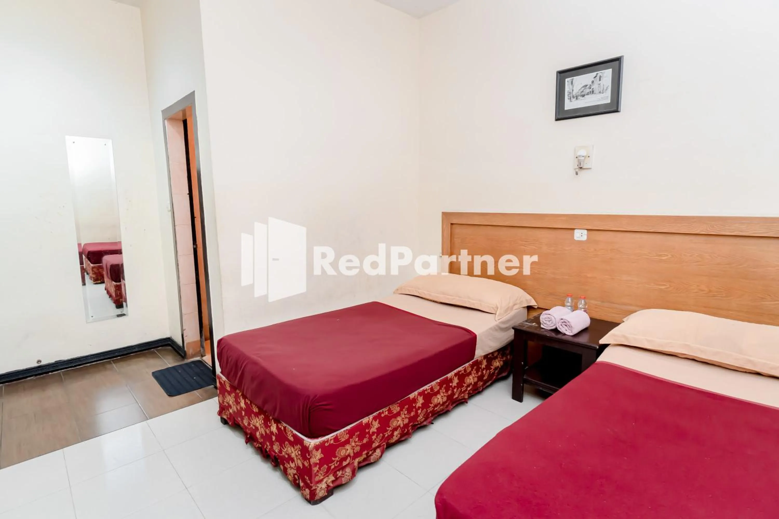 Bedroom, Bed in Cherry Pink Hotel Medan Mitra RedDoorz