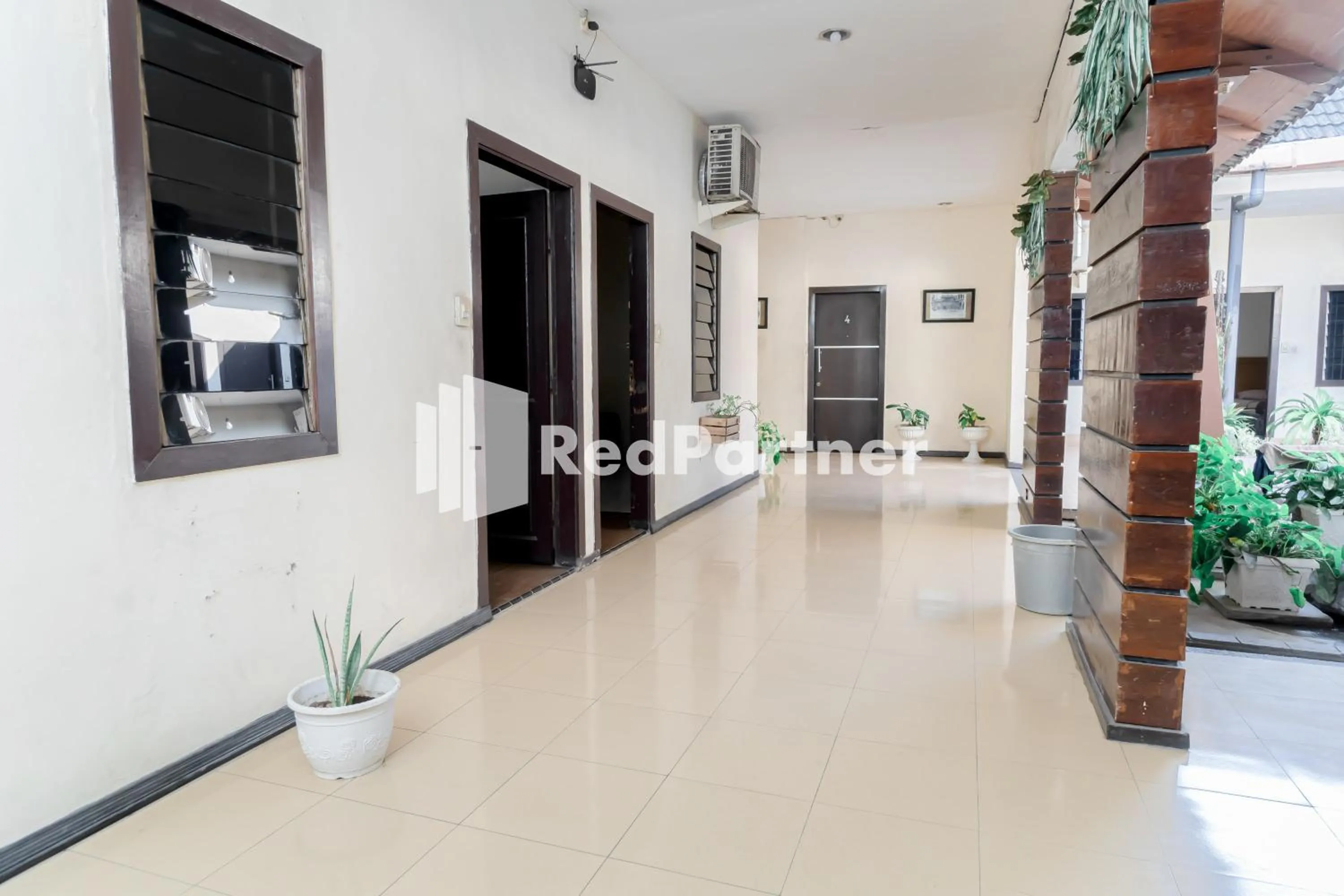 Property building in Cherry Pink Hotel Medan Mitra RedDoorz