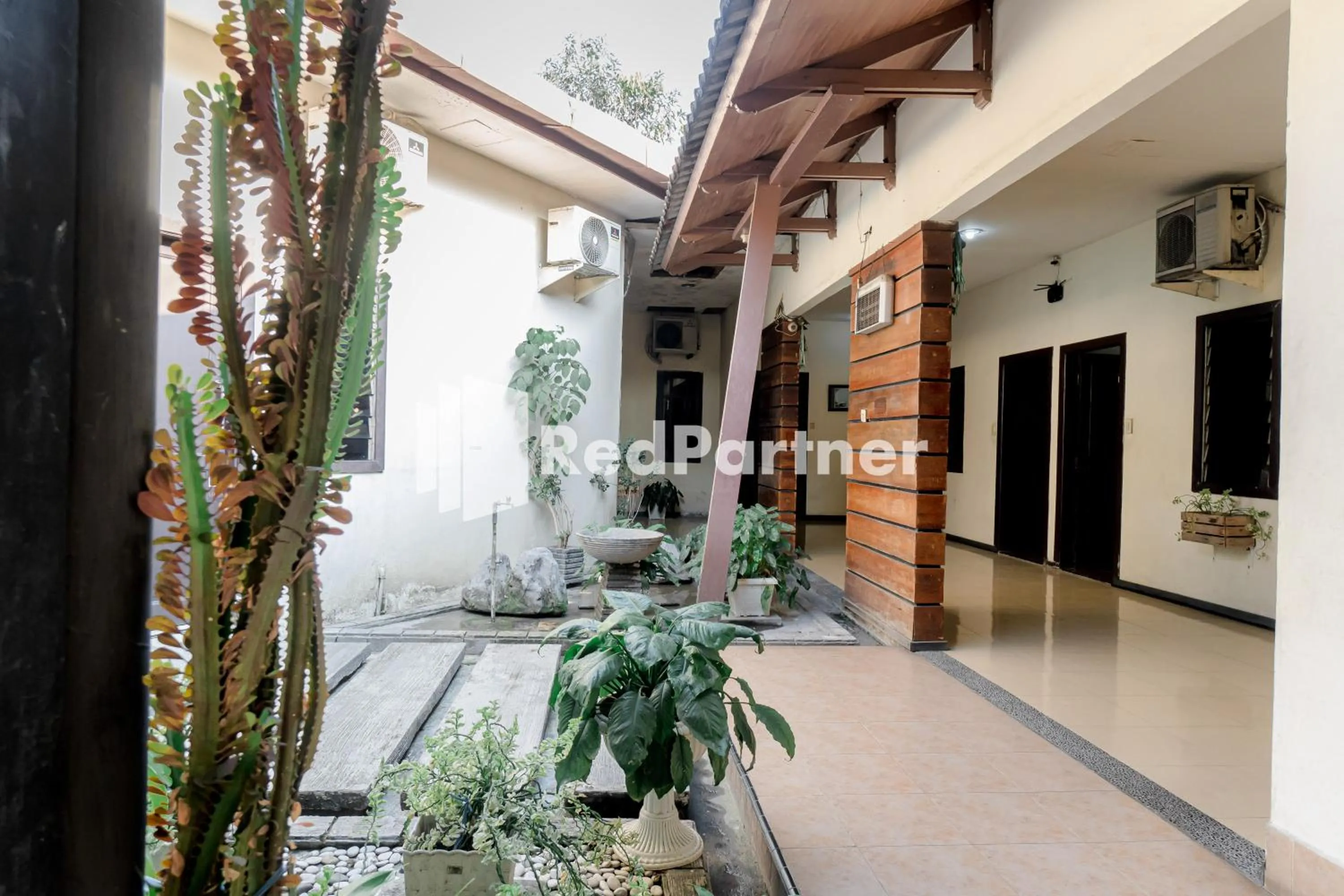 Property building in Cherry Pink Hotel Medan Mitra RedDoorz