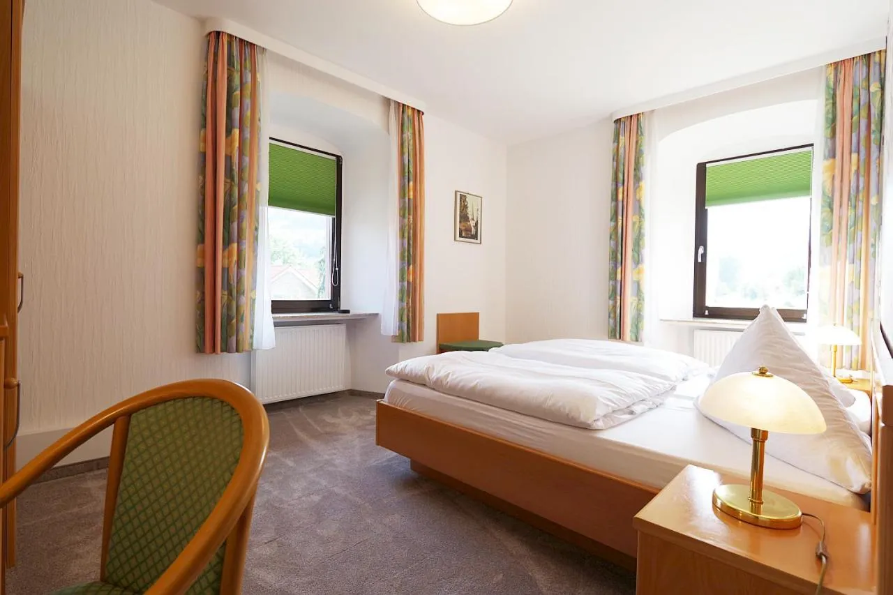 Bed in Land-gut-Hotel Räuber Lippoldskrug