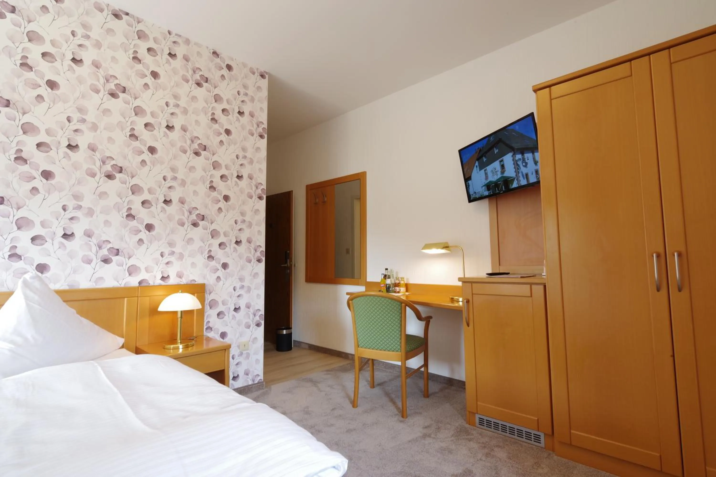 Bed in Land-gut-Hotel Räuber Lippoldskrug