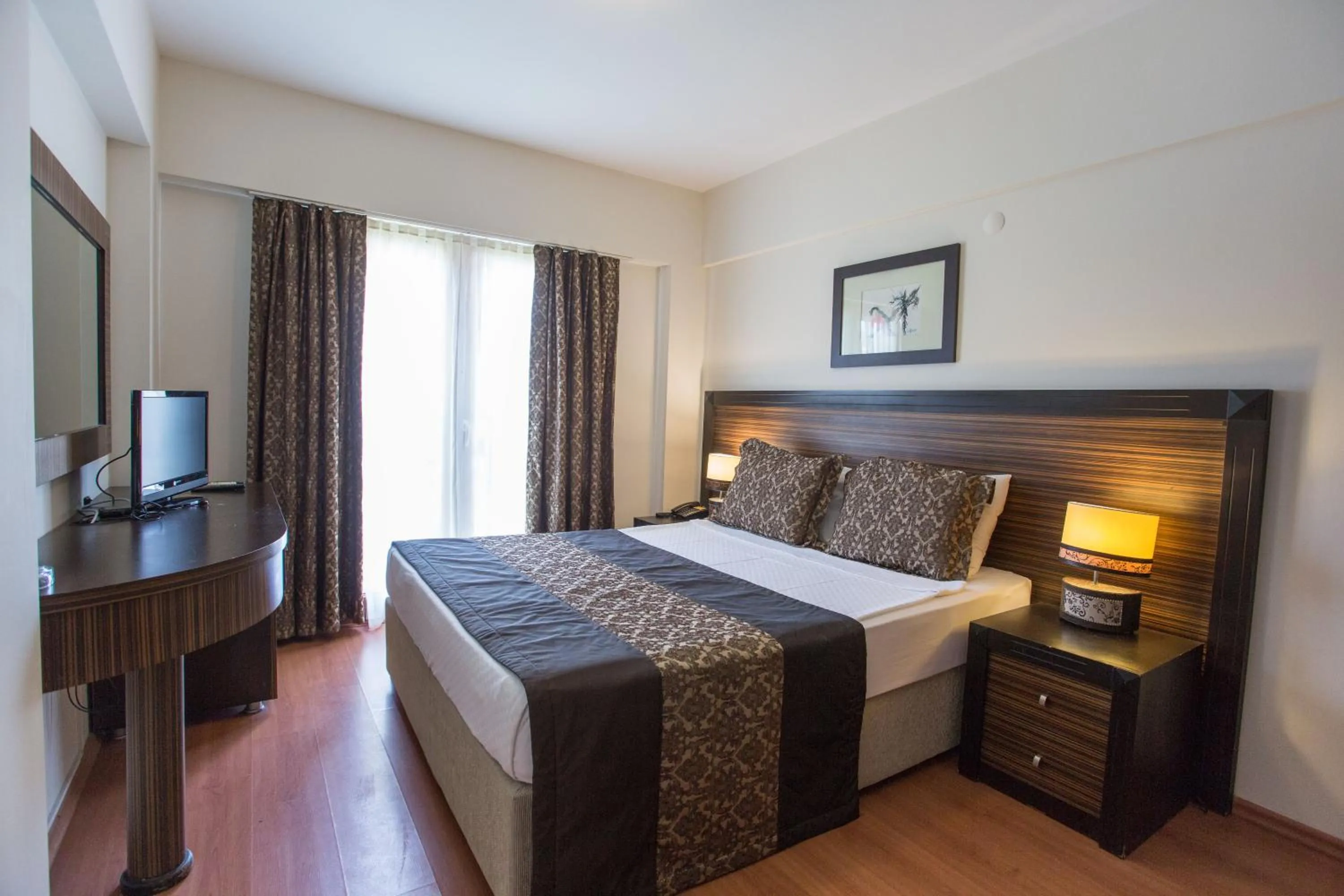 Bed in The One Club Hotel