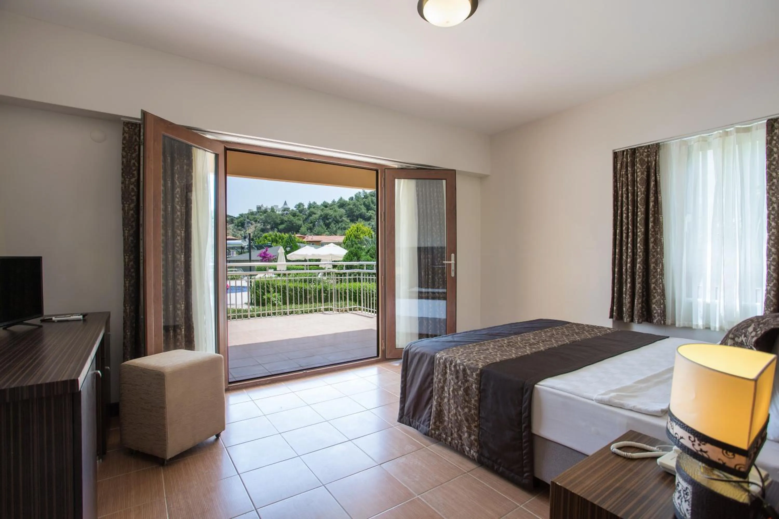 Bed in The One Club Hotel