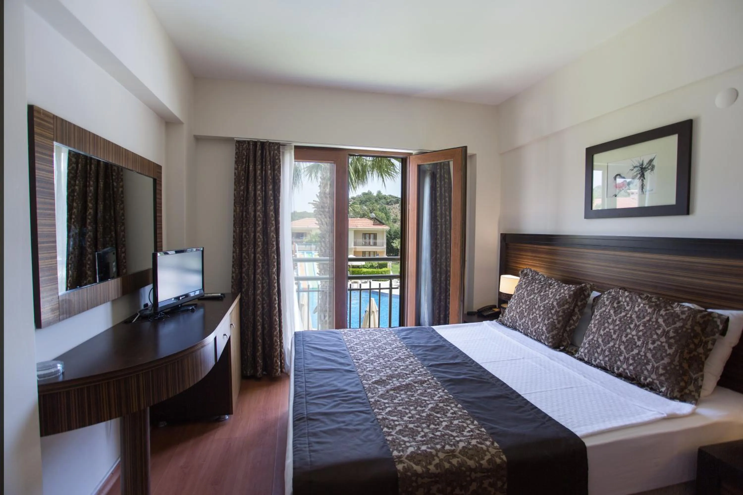 Bed in The One Club Hotel