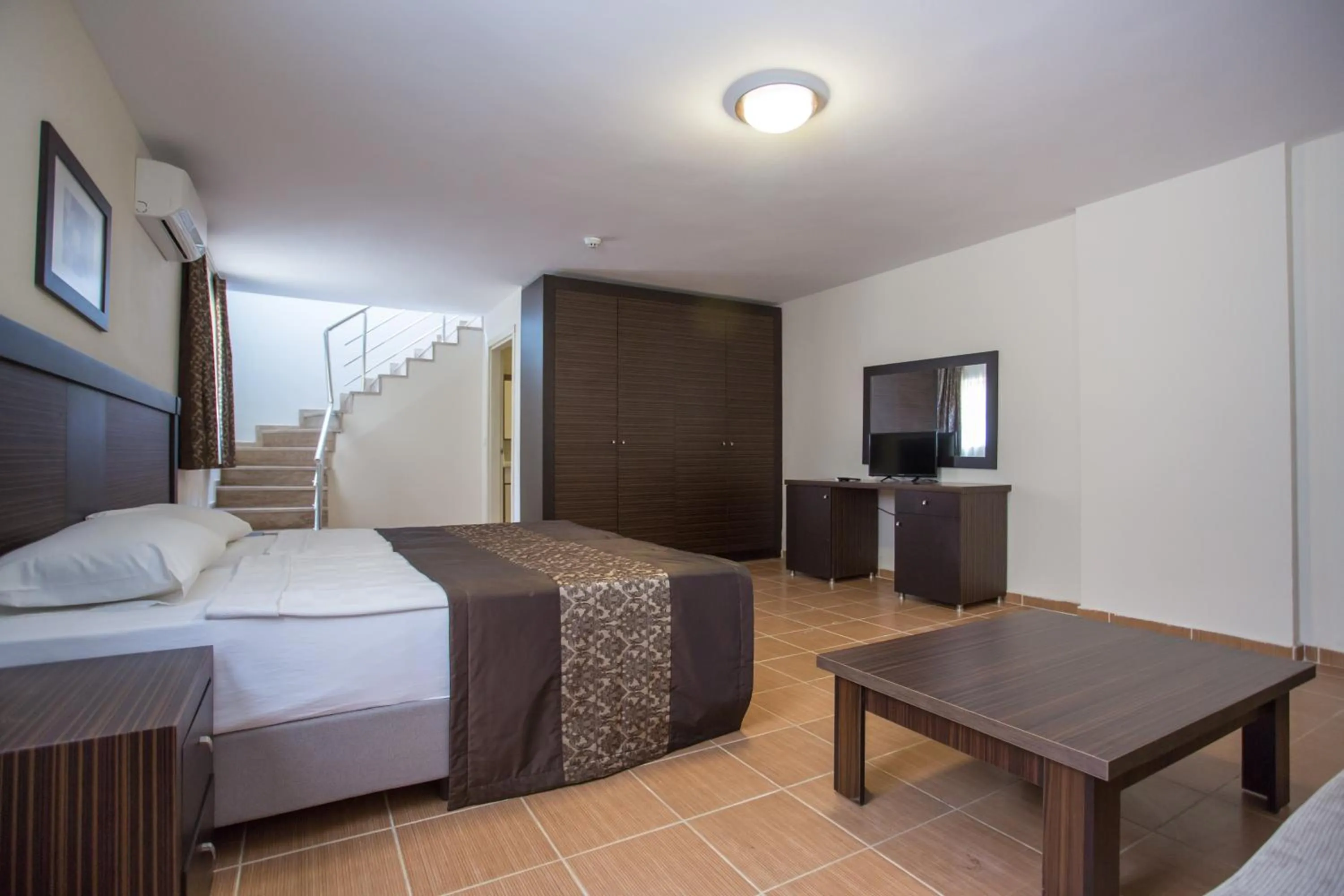 Bed in The One Club Hotel