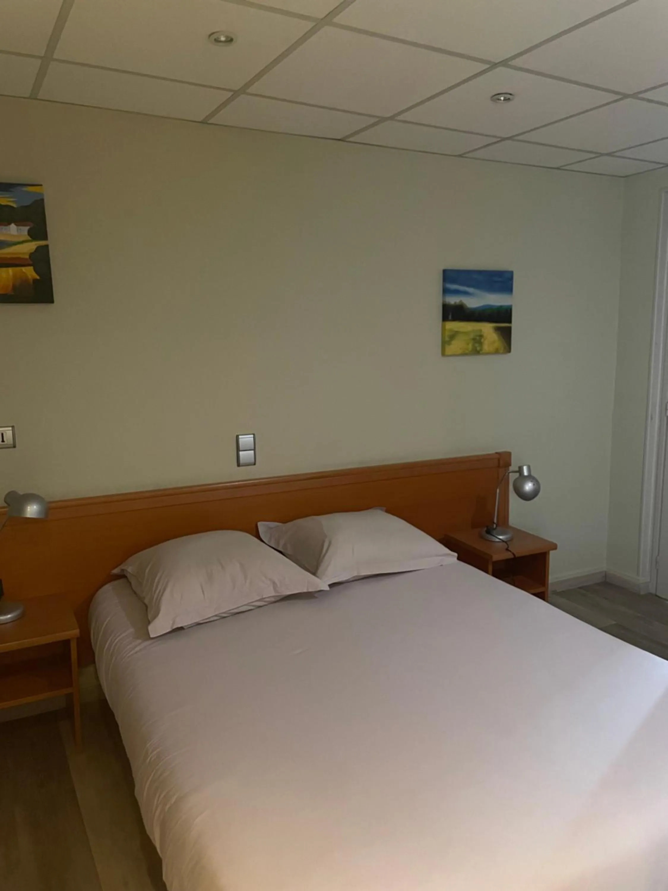 Bed in Hôtel de l'Europe