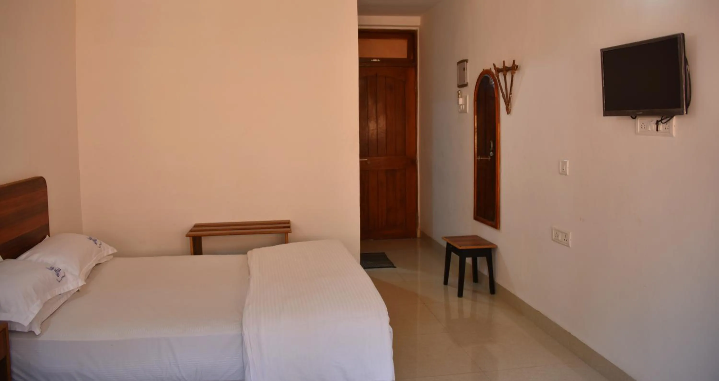 Bed in Hotel Kismat Mahal