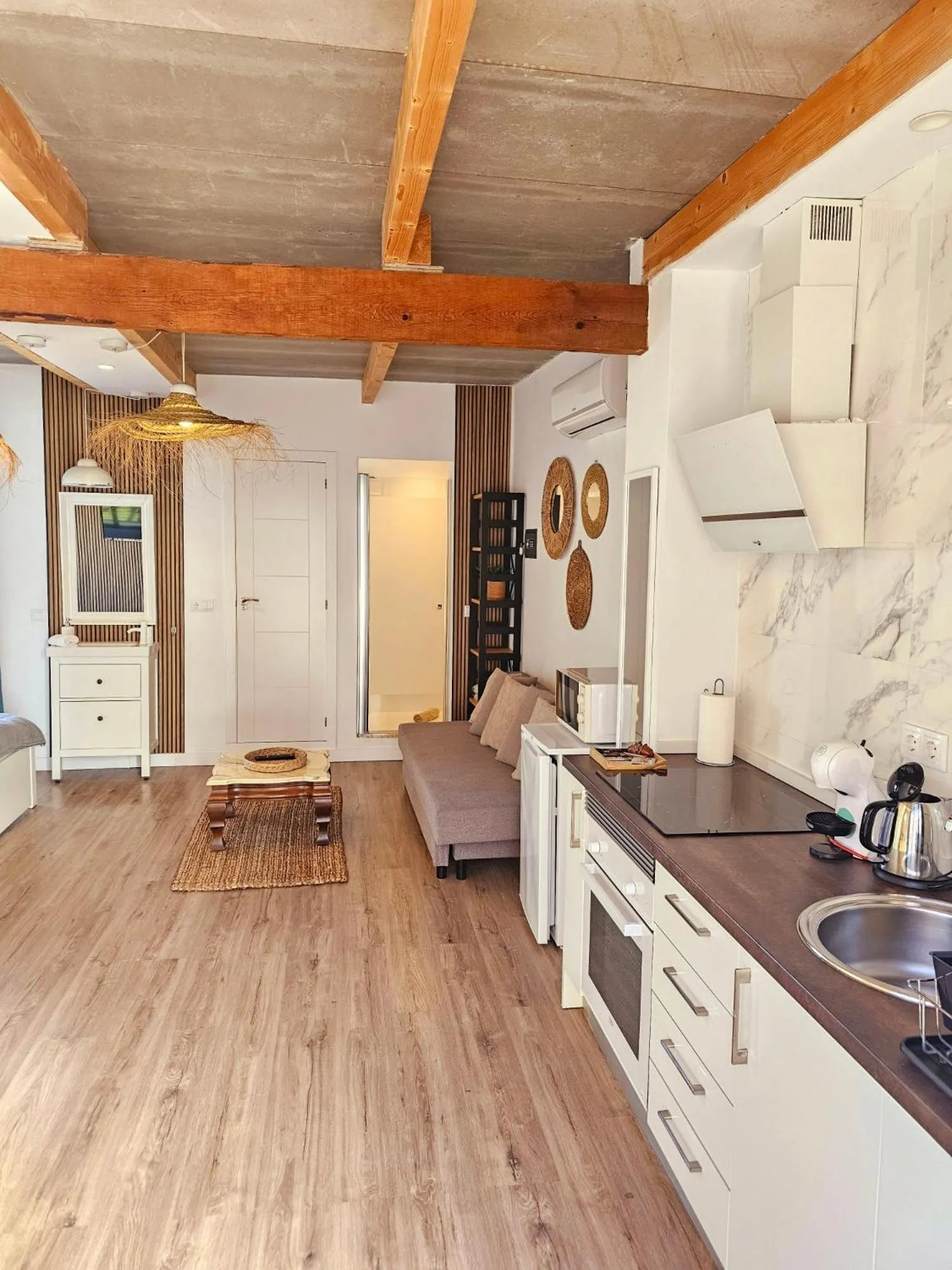 Kitchen or kitchenette in Apartamentos de la Huerta